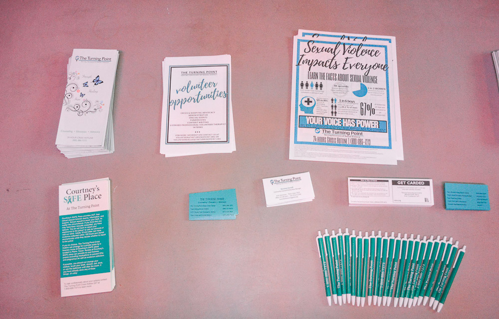  THE TURNING POINT table - for donations, awareness, volunteer opportunities and more information on sexual violence. 