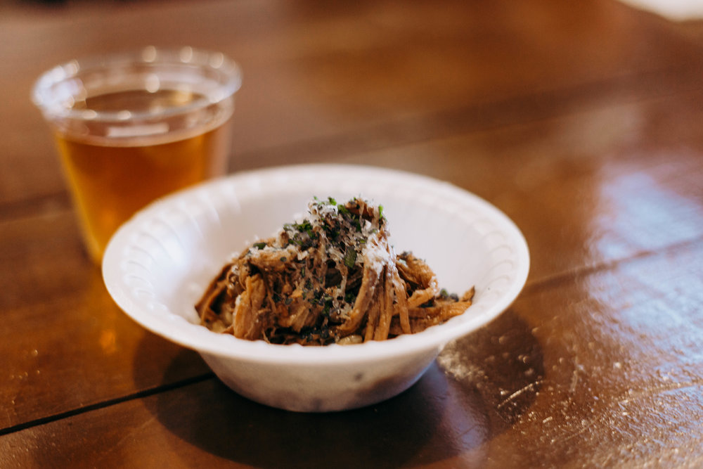  The fifth course, featuring Red Wine Braised Brisket Risotto, topped with Campo de Montalban cheese and paired with Armadillo’s Berliner Weisse. Photo by Jennifer Meza. 