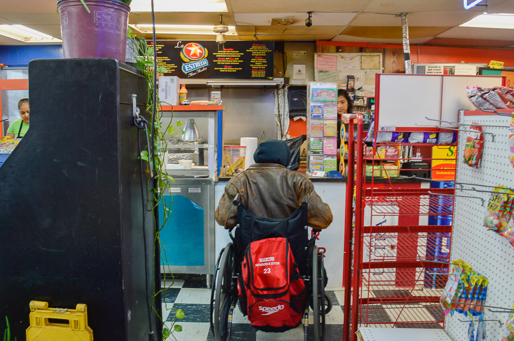  A customer at Estrella stocking up on Mexican goods. 