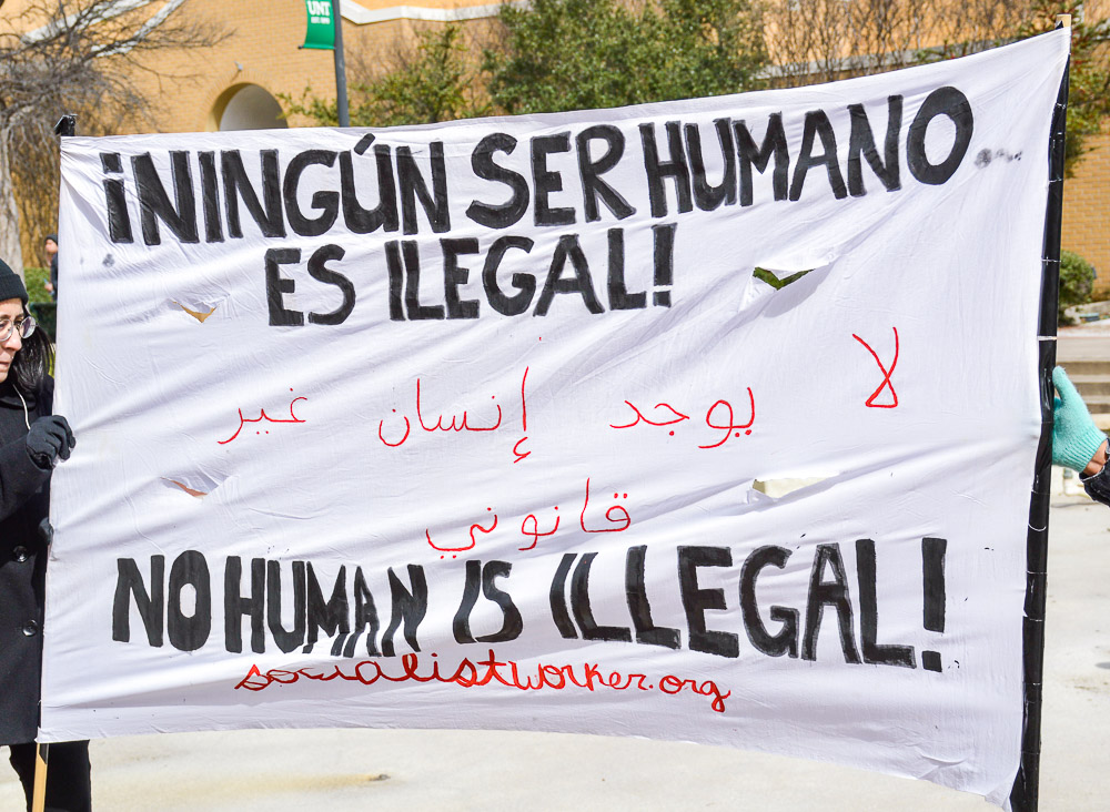  Close up of signs, UNT in the background. 