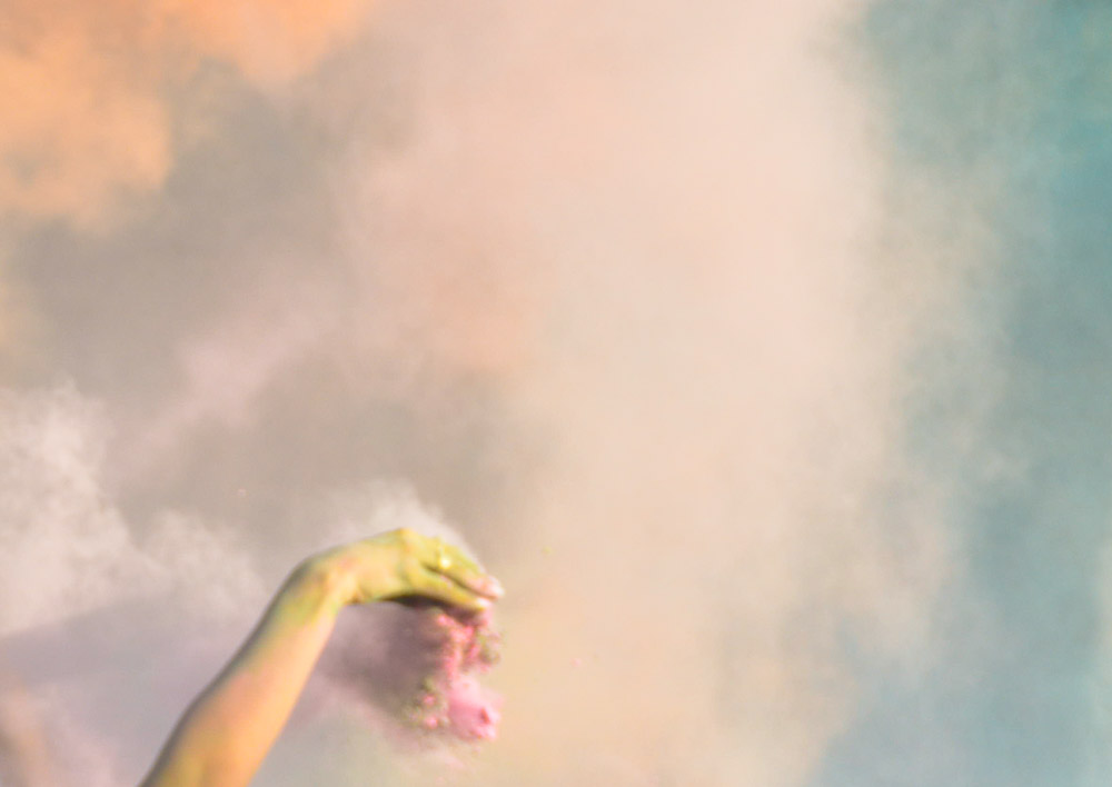  The signature clouds of powder, marking the most famous aspect of Holi. 