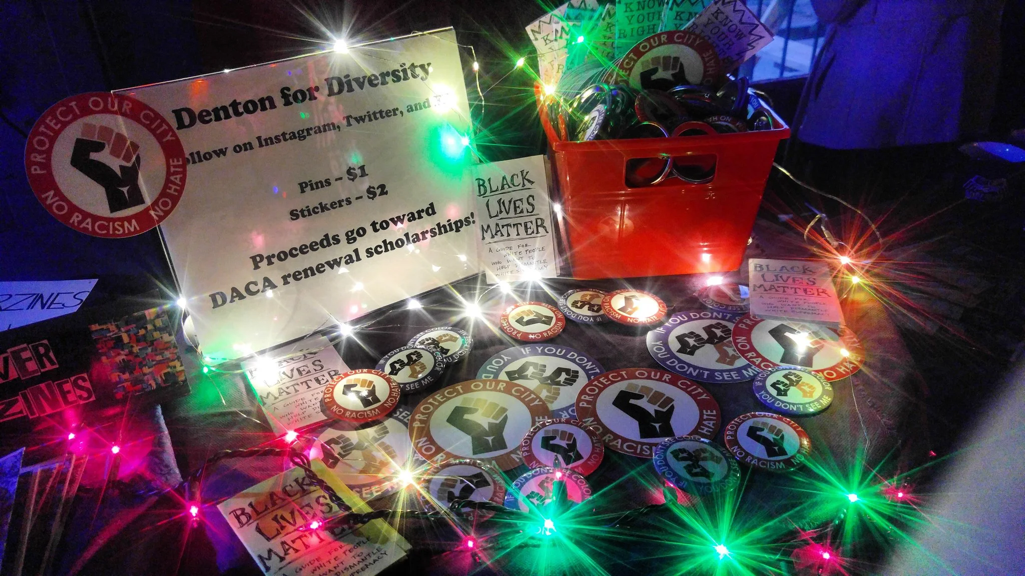 Photo of Denton for Diversity’s setup at Spiderweb Salon showcase. Photo taken by Sam Escalante.