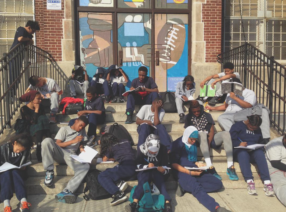 Valencia Clay's students working outside.