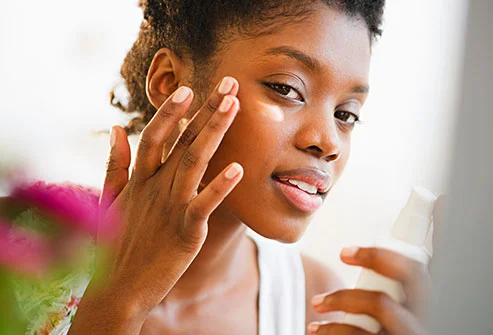 getty_rf_photo_of_woman_using_eye_cream.jpg