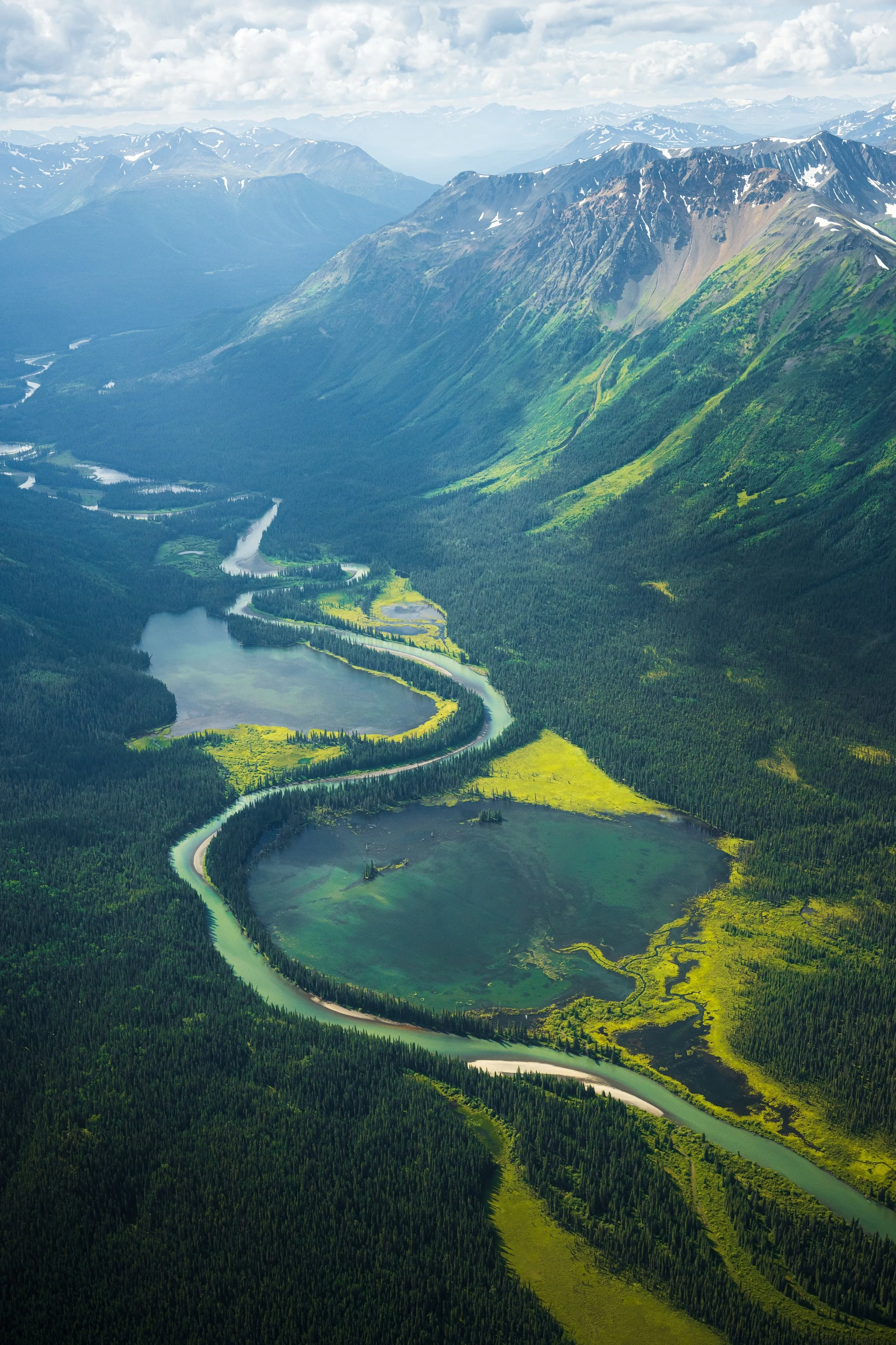 The winding waters of the Spatsizi River in Spatsizi Plateau Wilderness Provincial Park, captured as an aerial from a plane