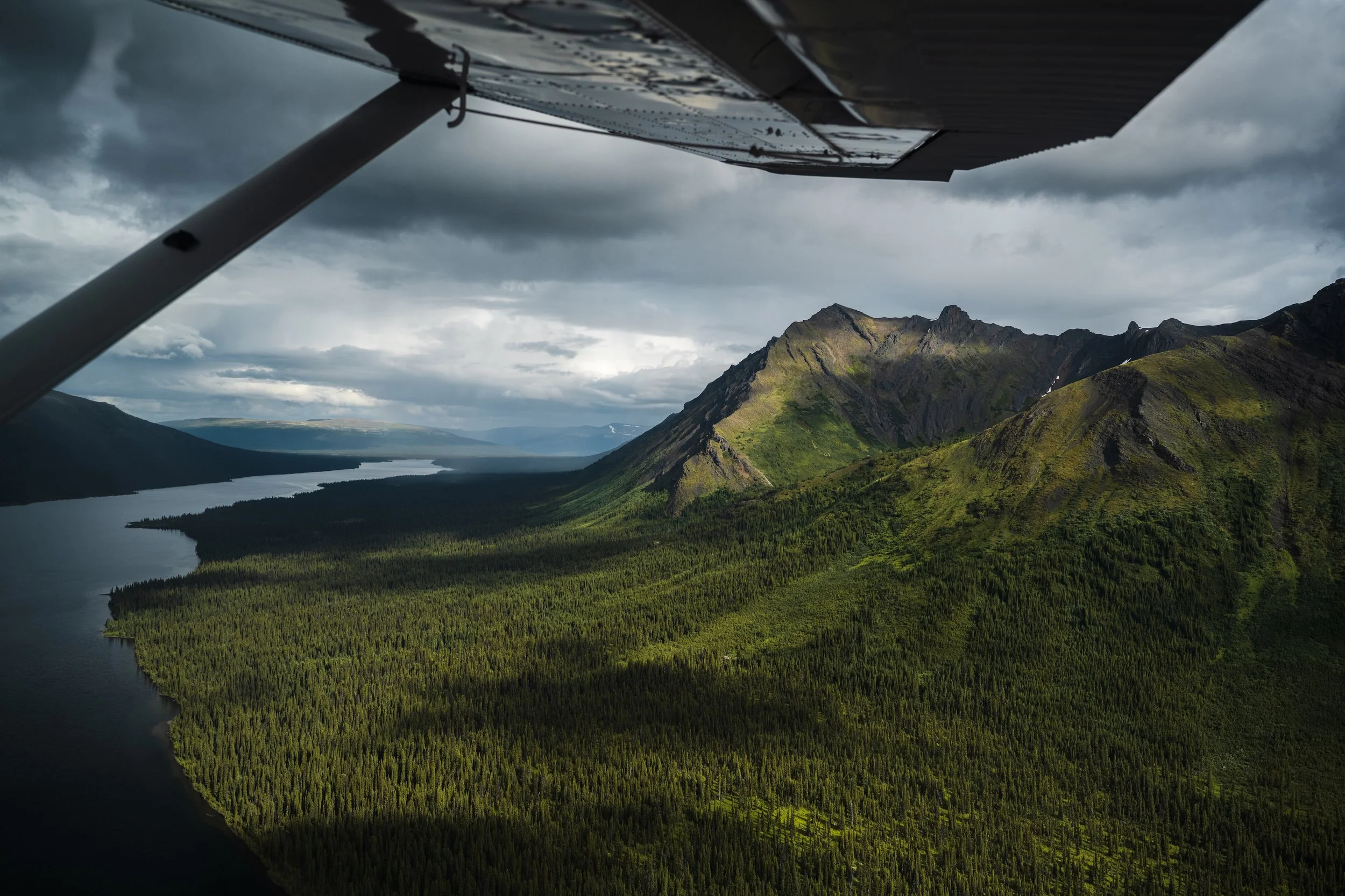 An aerial photograph of Kitchener Lake within Tatlatui Provincial Park, in Northern BC on a stormy day