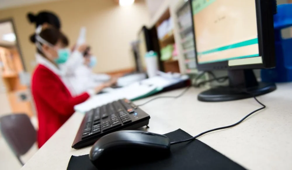 medical-workers-typing-in-clinic.jpg