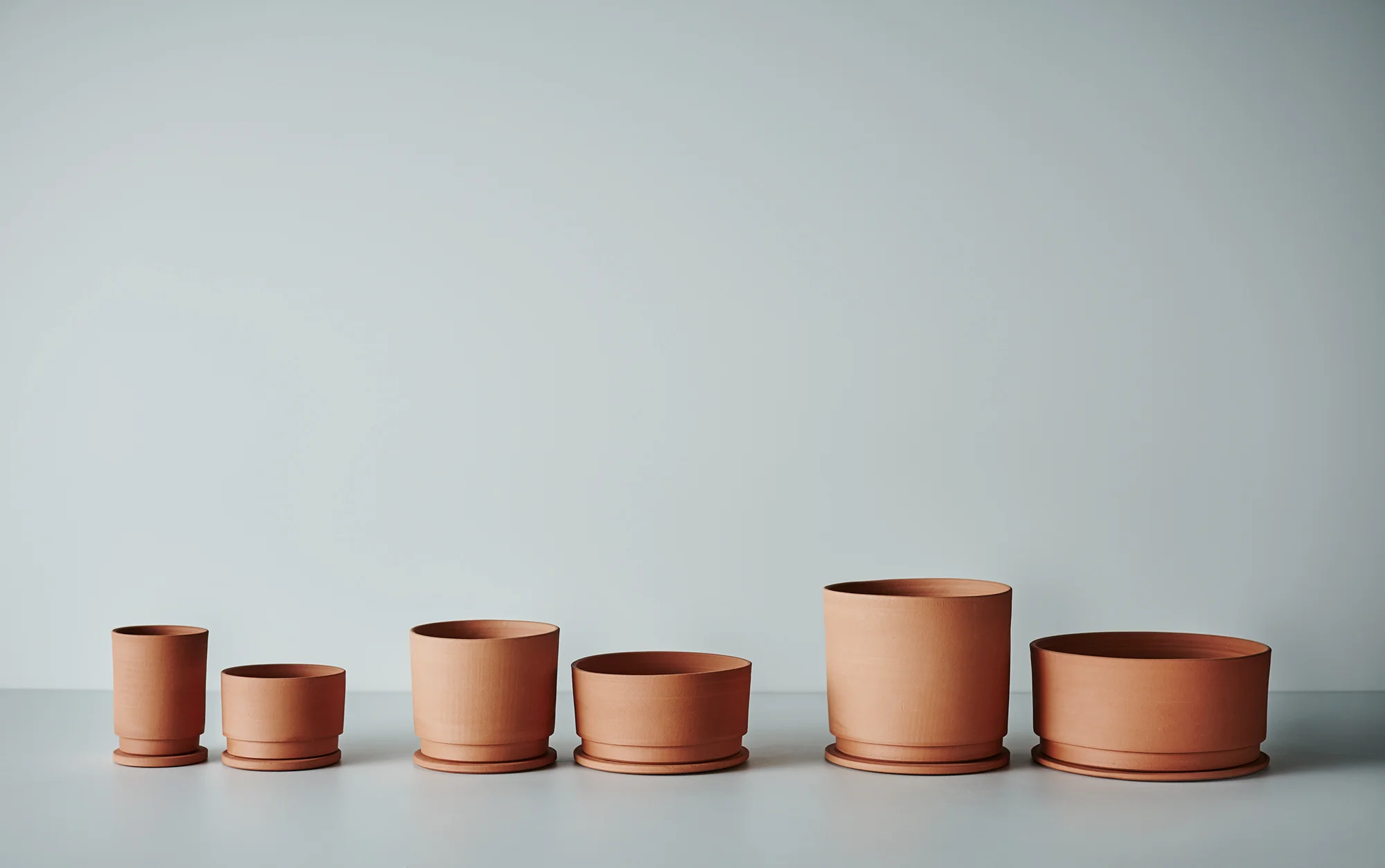 All sizes of Undercut Planters in Terracotta