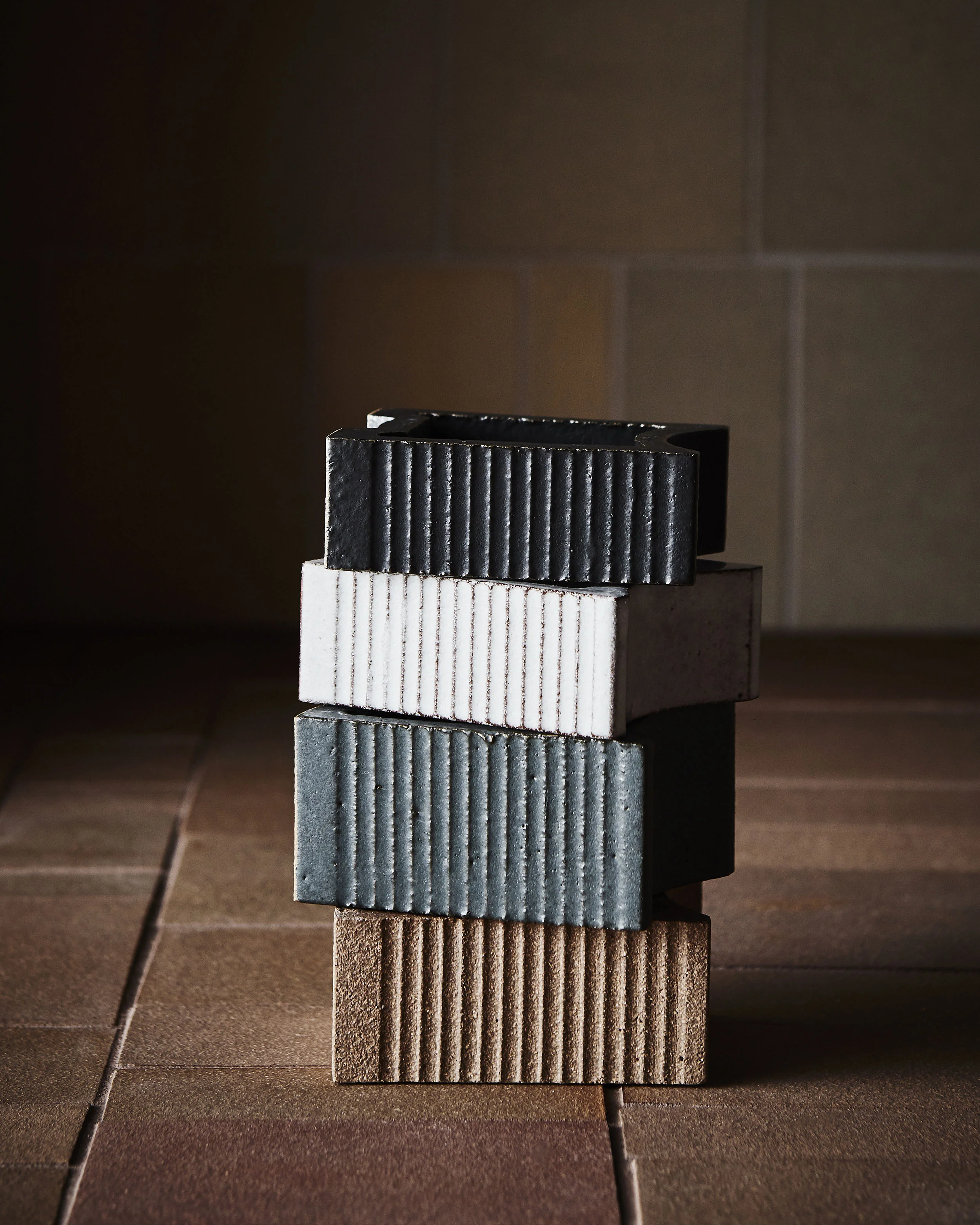 Flute Charcoal, Speckled White, Dark Grey and Natural Glaze Finishes