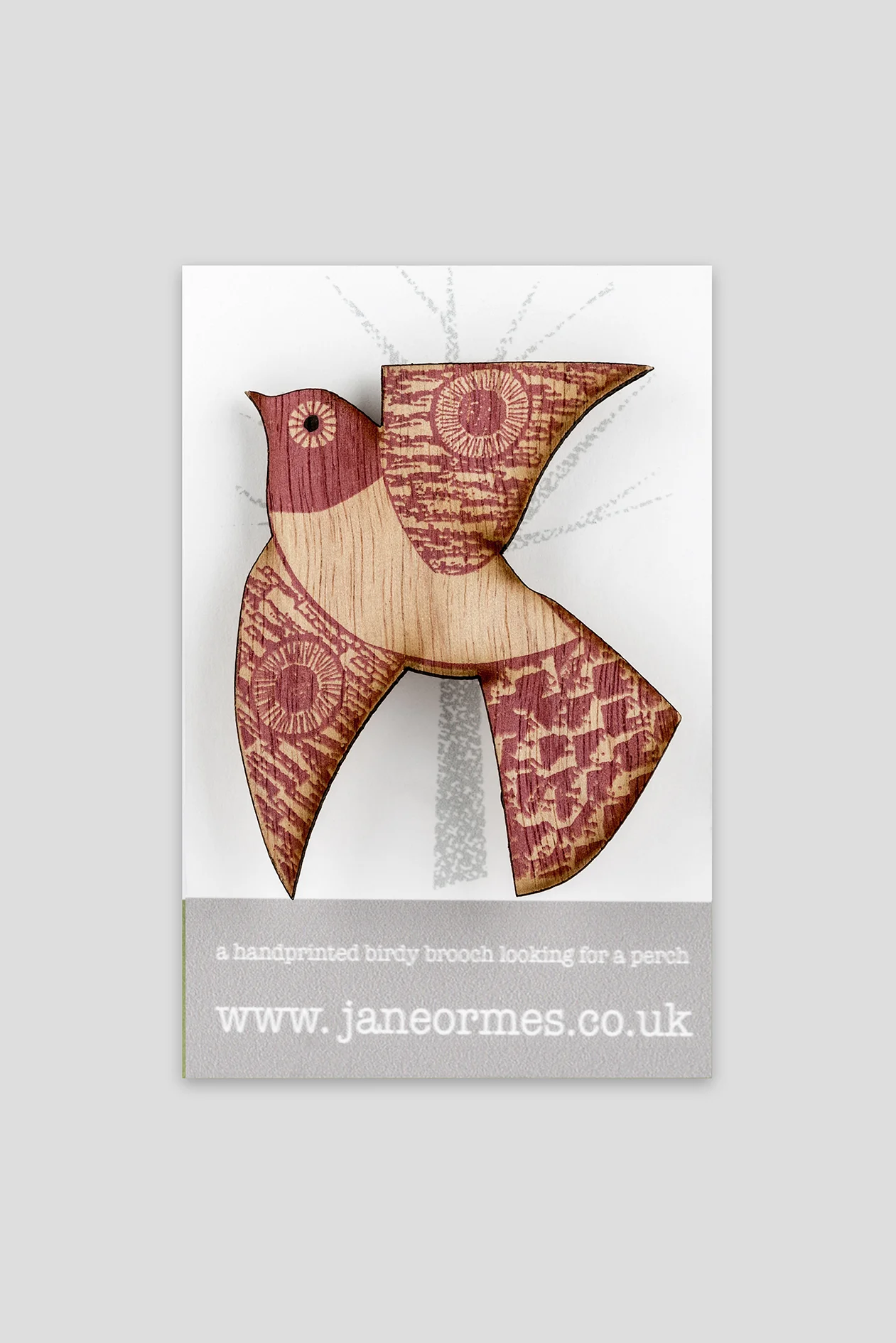 Raspberry White Tummied flying bird brooch