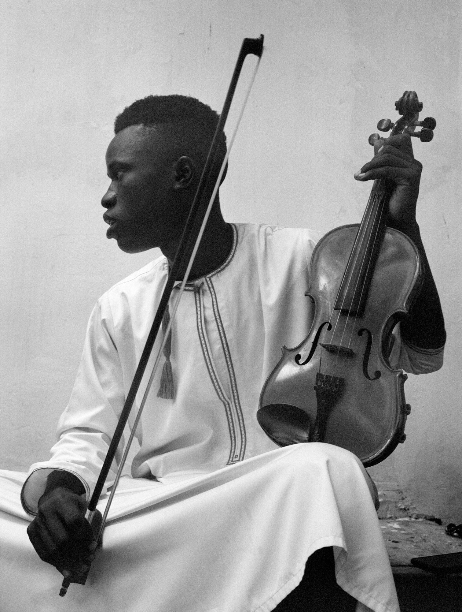  Taarab violin player at traditional Pilau ceremony - Stone Town, 2019 