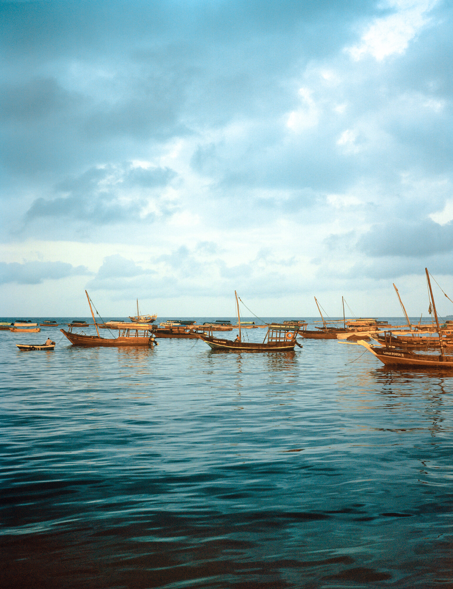  Morning light over traditional Dhow boats, Stone Town, 2019 