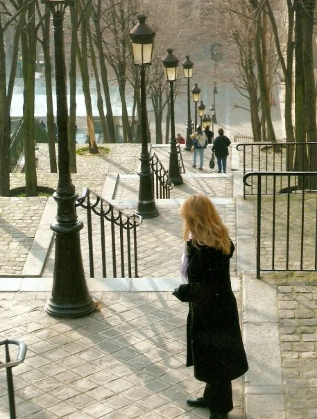Me in Paris many moons ago. I love the blue and grey colors. Something about it reminds me of oysters. Photo Credit: P. Bright