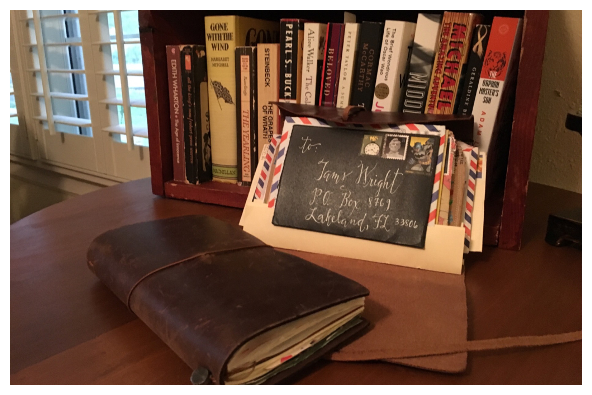 Letters bound in a leather journal can be displayed along with books in your office or home library.