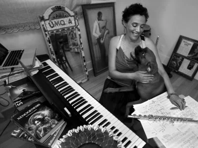 Nicole Mitchell is a creative flutist, composer, bandleader and educator. As the founder of Black Earth Ensemble, Black Earth Strings, Ice Crystal and Sonic Projections, Mitchell has been repeatedly awarded by DownBeat Critics Poll and the Jazz Journalists Association as “Top Flutist of the Year” for the last four years (2010-2014). Mitchell’s music celebrates African American culture while reaching across genres and integrating new ideas with moments in the legacy of jazz, gospel, experimentalism, pop and African percussion through albums such as Black Unstoppable (Delmark, 2007), Awakening (Delmark, 2011), and Xenogenesis Suite: A Tribute to Octavia Butler (Firehouse 12, 2008), which received commissioning support from Chamber Music America’s New Jazz Works. Mitchell formerly served as the first woman president of Chicago's Association for the Advancement of Creative Musicians (AACM), and has been a member since 1995. In recognition of her impact within the Chicago music and arts education communities, she was named “Chicagoan of the Year” in 2006 by the Chicago Tribune. With her ensembles, as a featured flutist and composer, Mitchell has been a highlight at festivals and art venues throughout Europe, the U.S. and Canada. Ms. Mitchell is a recipient of the prestigious Alpert Award in the Arts (2011) and has been commissioned by Chicago’s Museum of Contemporary Art, the Ravinia Festival, the Chicago Jazz Festival, International Contemporary Ensemble (ICE), the Chicago Sinfonietta Orchestra and Maggio Fiorentino Chamber Orchestra (Florence, Italy). In 2009, she created Honoring Grace: Michelle Obama for the Jazz Institute of Chicago. She has been a faculty member at the Vancouver Creative Music Institute, the Sherwood Flute Institute, Banff International Jazz Workshop and the University of Illinois, Chicago. Her work has been featured on National Public Radio, and in magazines including Ebony, Downbeat, JazzIz, Jazz Times, Jazz Wise, and American Legacy . Nicole MItchell is currently a Professor of Music, teaching in " Integrated Composition, Improvisation and Technology ," (ICIT) a new and expansively-minded graduate program at the University of California, Irvine. In November 2014, ICIT was approved for the unleashing of a new MA/PhD program, which will be offered starting fall 2015. Mitchell's recent composition, Flight for Freedom for Creative Flute and Orchestra, a Tribute to Harriet Tubman , premiered with the Chicago Composers’ Orchestra in December 2011 and was presented again with CCO in May 2014. She was also commisisoned by Chicago Sinfonietta for Harambee: Road to Victory, for Solo Flute, Choir and Orchestra in January 2012. Her latest commission was from the French Ministry of Culture and the Royaumont Foundation in October 2014, which supported the development and French tour of Beyond Black - a collaboration with kora master Ballake Sissoko, Black Earth Ensemble and friends. Currently Mitchell is preparing her next commission supported by the French American Jazz Exchange, entitled Moments of Fatherhood, featuring Black Earth Ensemble and the Parisian chamber group L'Ensemble Laborintus, to premiere at the Sons d'hiver Jazz Festival in late January 2015. Among the first class of Doris Duke Artists (2012), Mitchell works to raise respect and integrity for the improvised flute, to contribute her innovative voice to the jazz legacy, and to continue the bold and exciting directions that the AACM has charted for decades. With contemporary ensembles of varying instrumentation and size (from solo to orchestra), Mitchell’s mission is to celebrate the power of endless possibility by “creating visionary worlds through music that bridge the familiar and the unknown.” She is endorsed by Powell flutes .