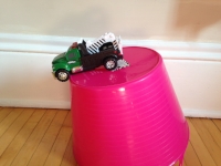Truck has lots of energy to play and do cool things, like climbing up and jumping off this mountain. 