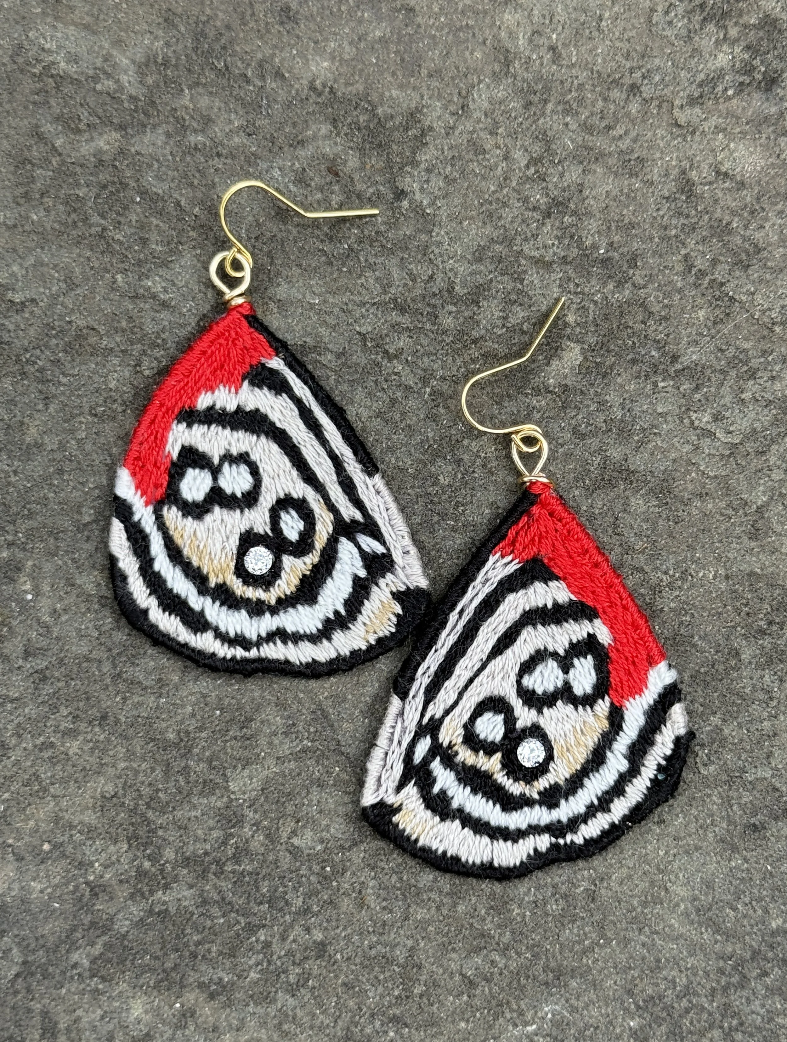 blk wht red moth earrings.JPG