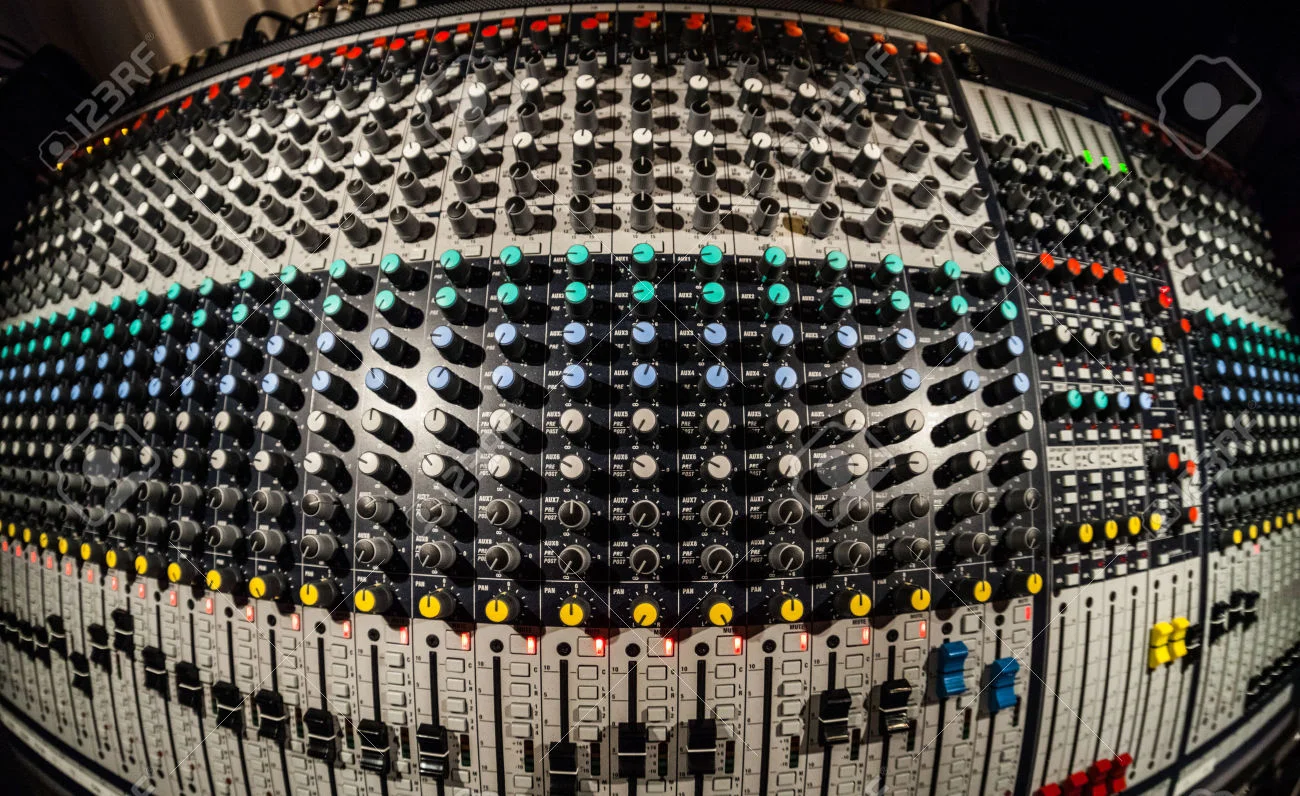 28700676-Mixing-Board-in-a-recording-studio-Stock-Photo.jpg