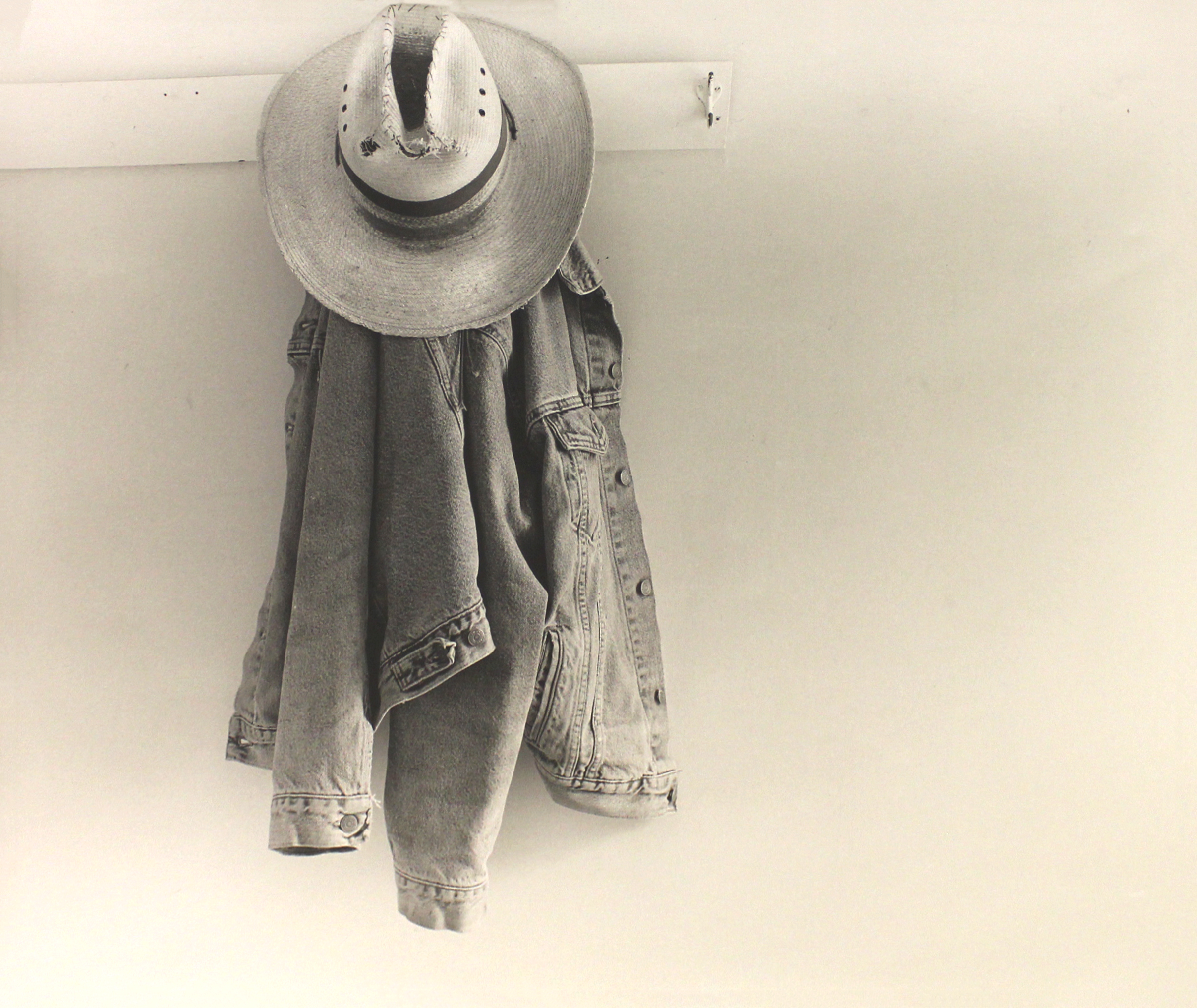 JUNE VAN CLEEF, Levi Jacket and Straw Hat on the Porch, 2001; Wood Ranch on the Highlands; Near Marfa, Presidio County, Texas, 2001