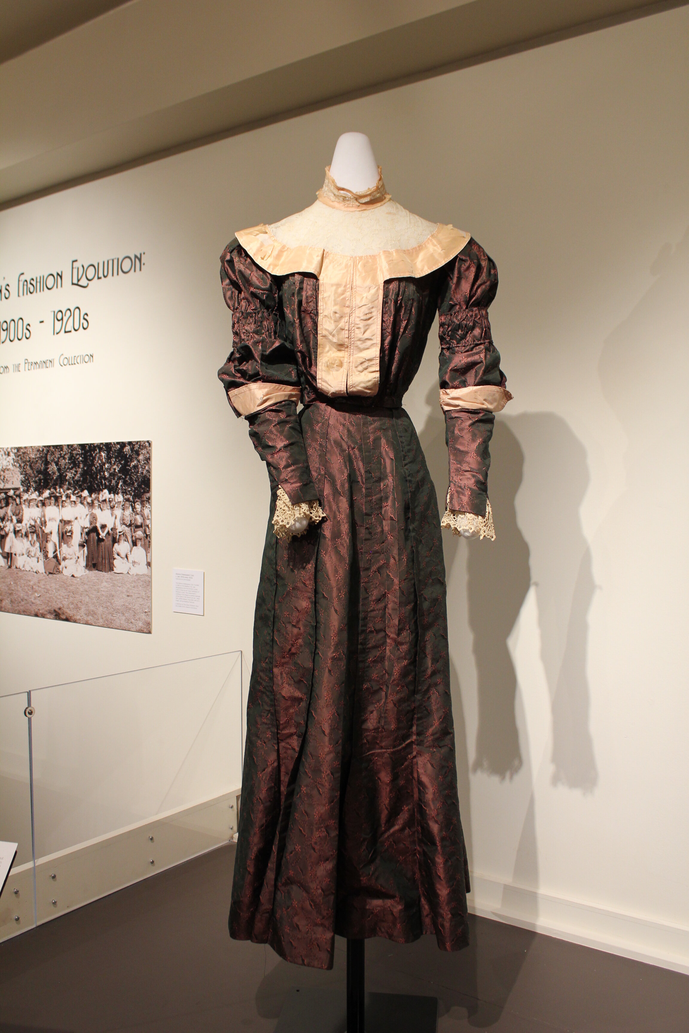 Second-Day Dress, 1897, silk, taffeta, lace, cotton threadingMany affluent women in the south had another dress made for the day after their wedding for family visits, parties, and other post-wedding events. Although this dress had a bustle at one p…