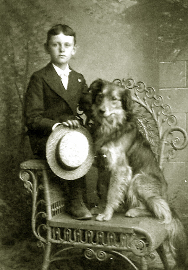 boy with his dog, photographer unknown.jpg