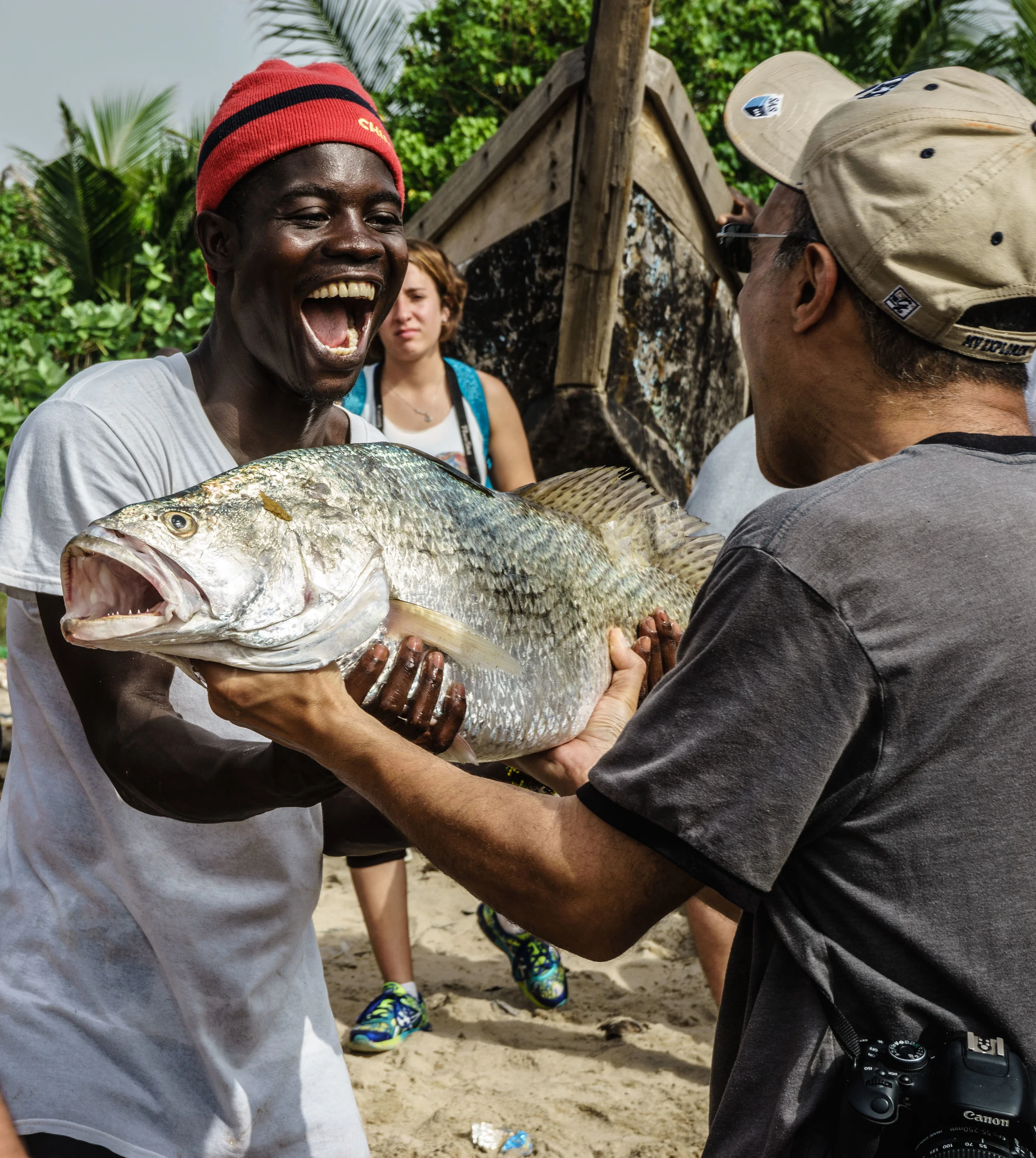 People admiring the catch