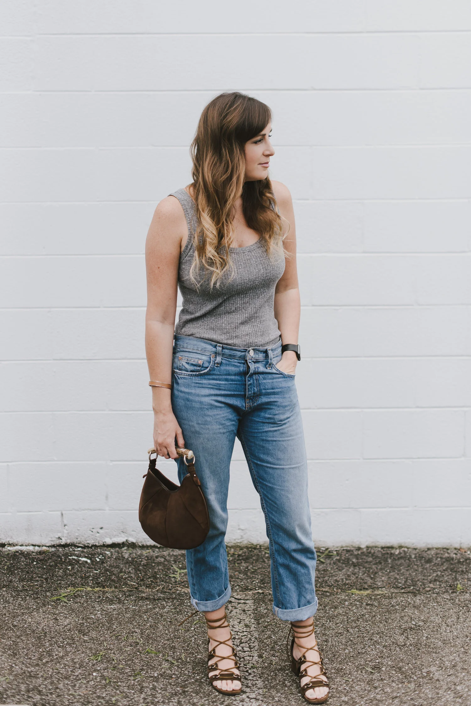 gray tank and block heels