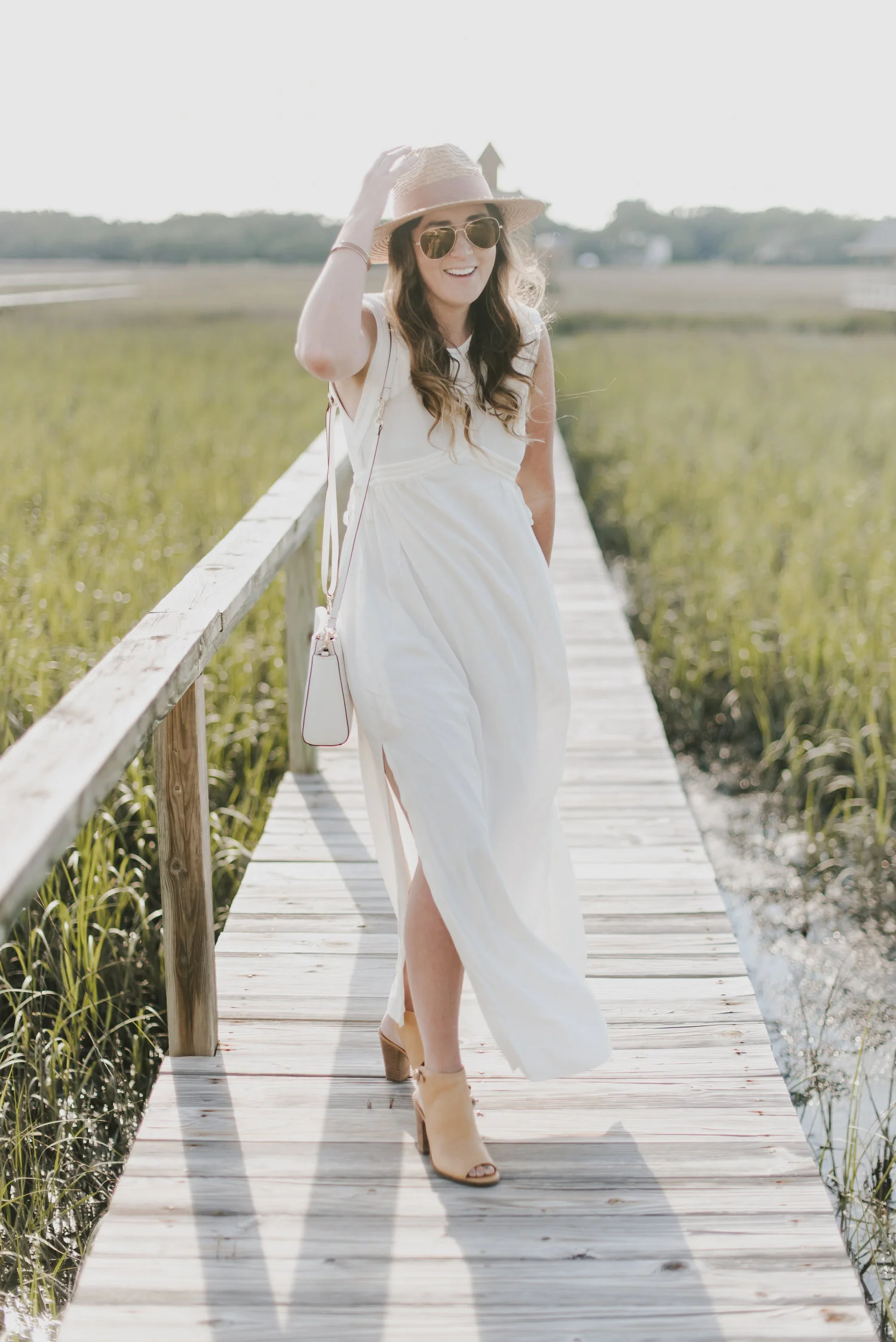 white dress with straw hat