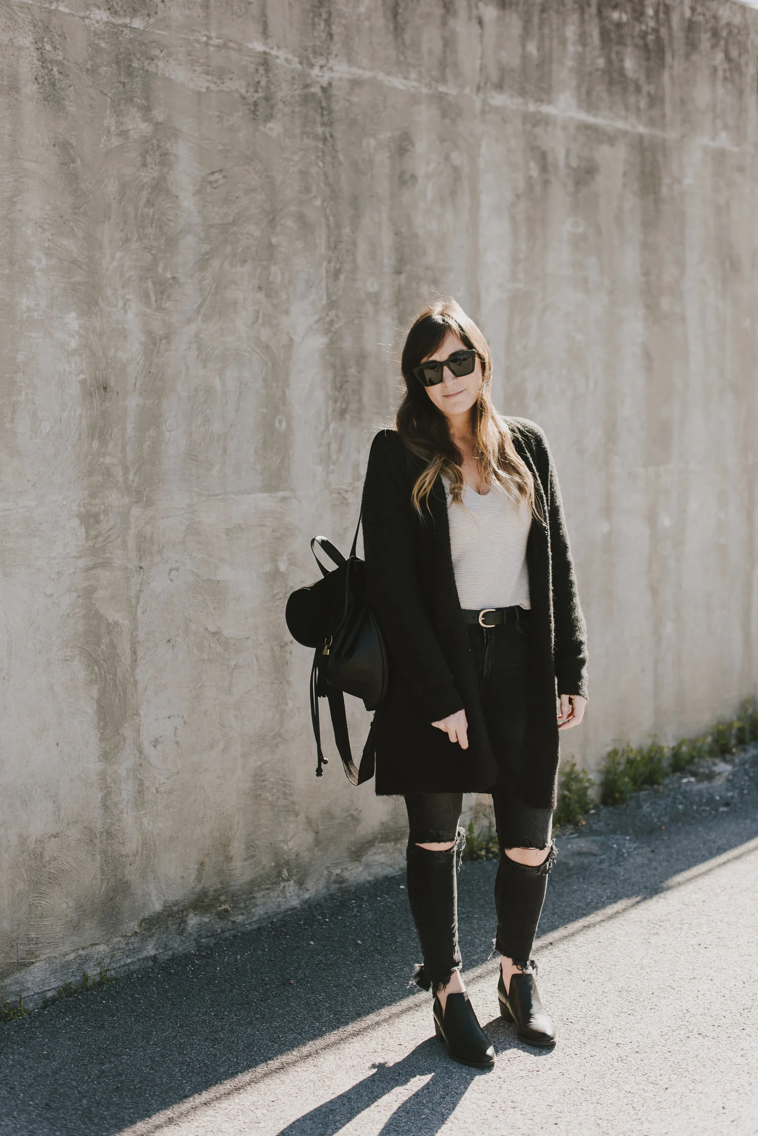 black cardigan and black jeans