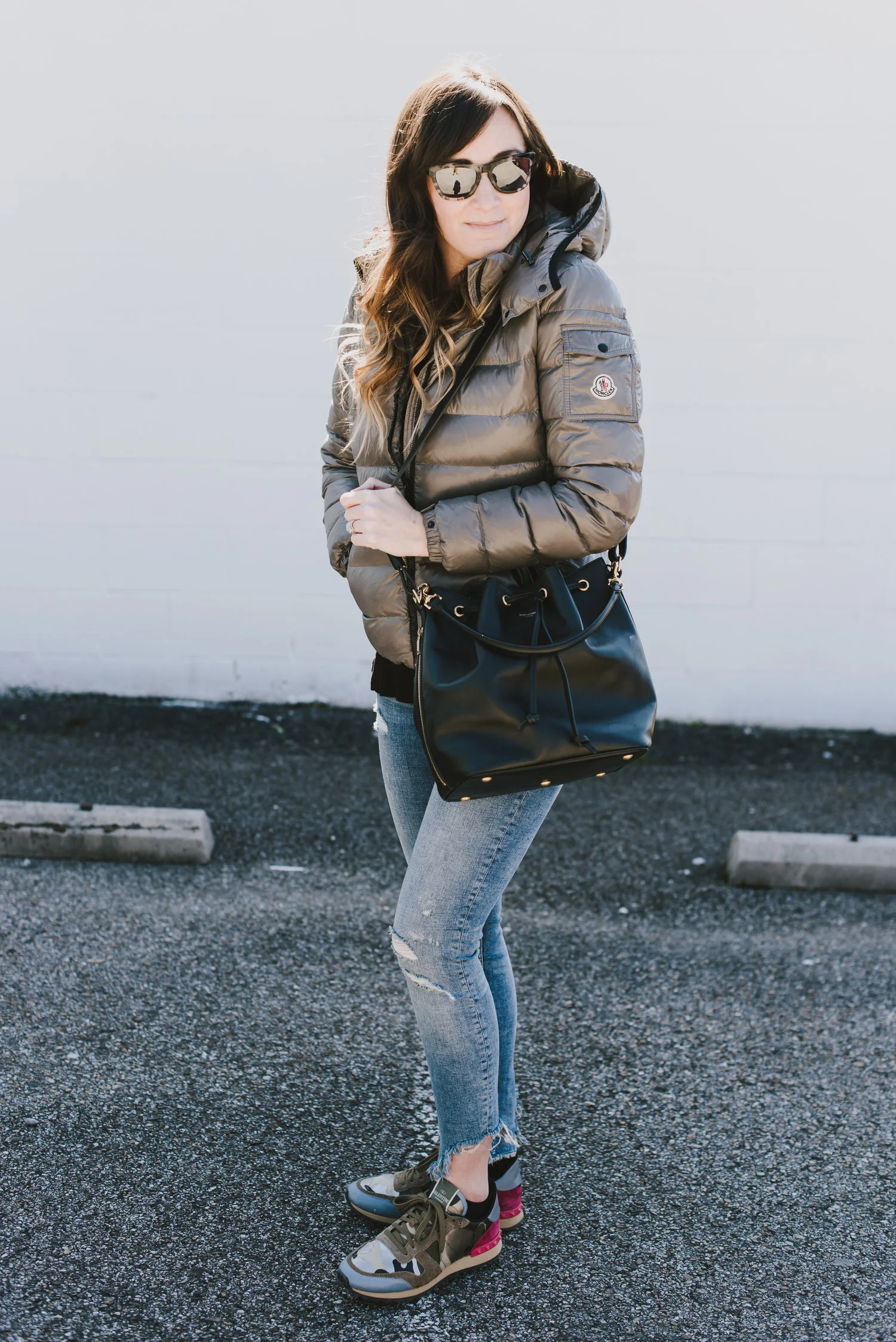 puffer coat and camo sneakers