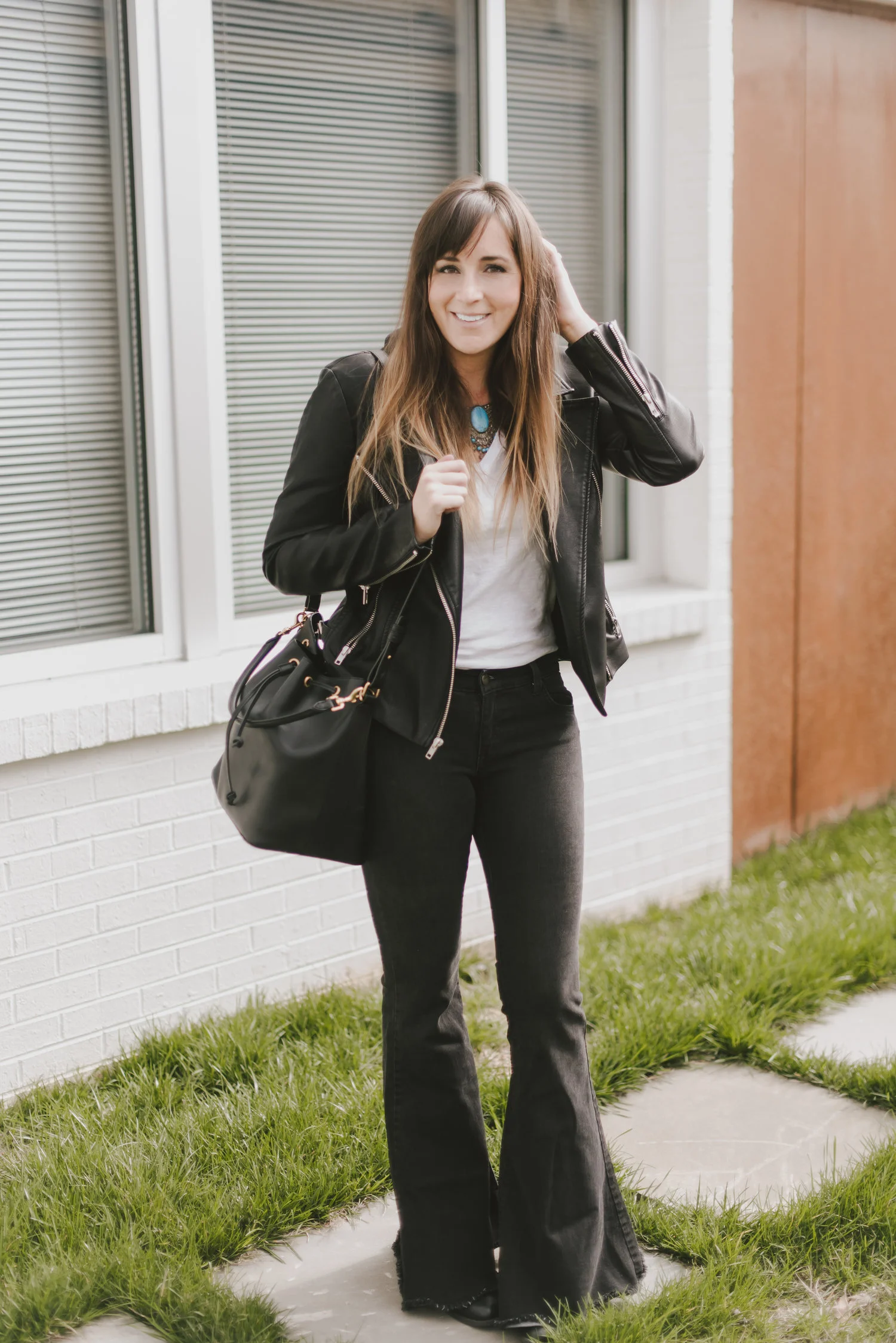 black flares and moto jacket
