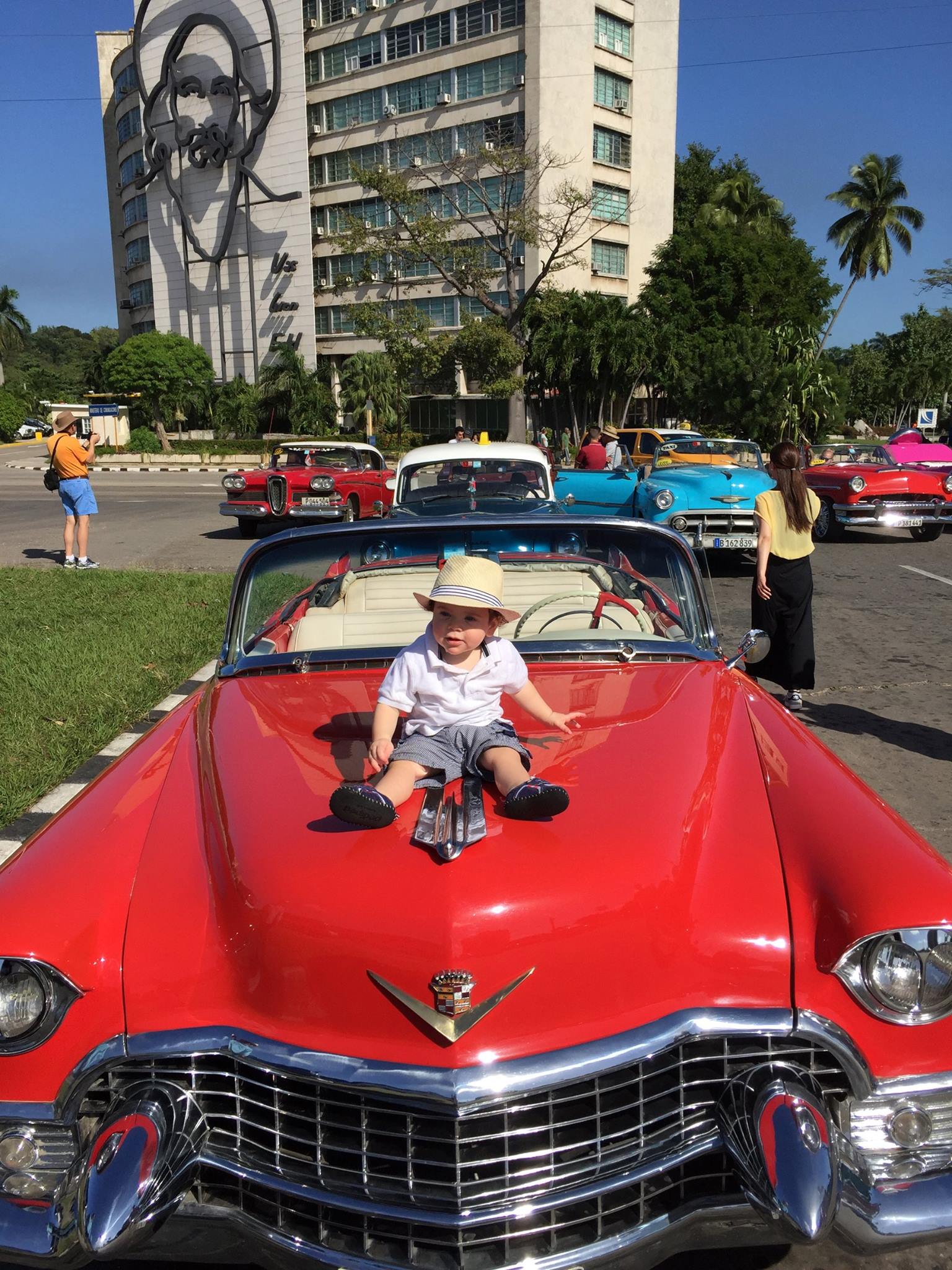   My favorite new friend, Troy aka Dabba Dabba, showing off his cuba outfit on the hood of this gorgeous car.  