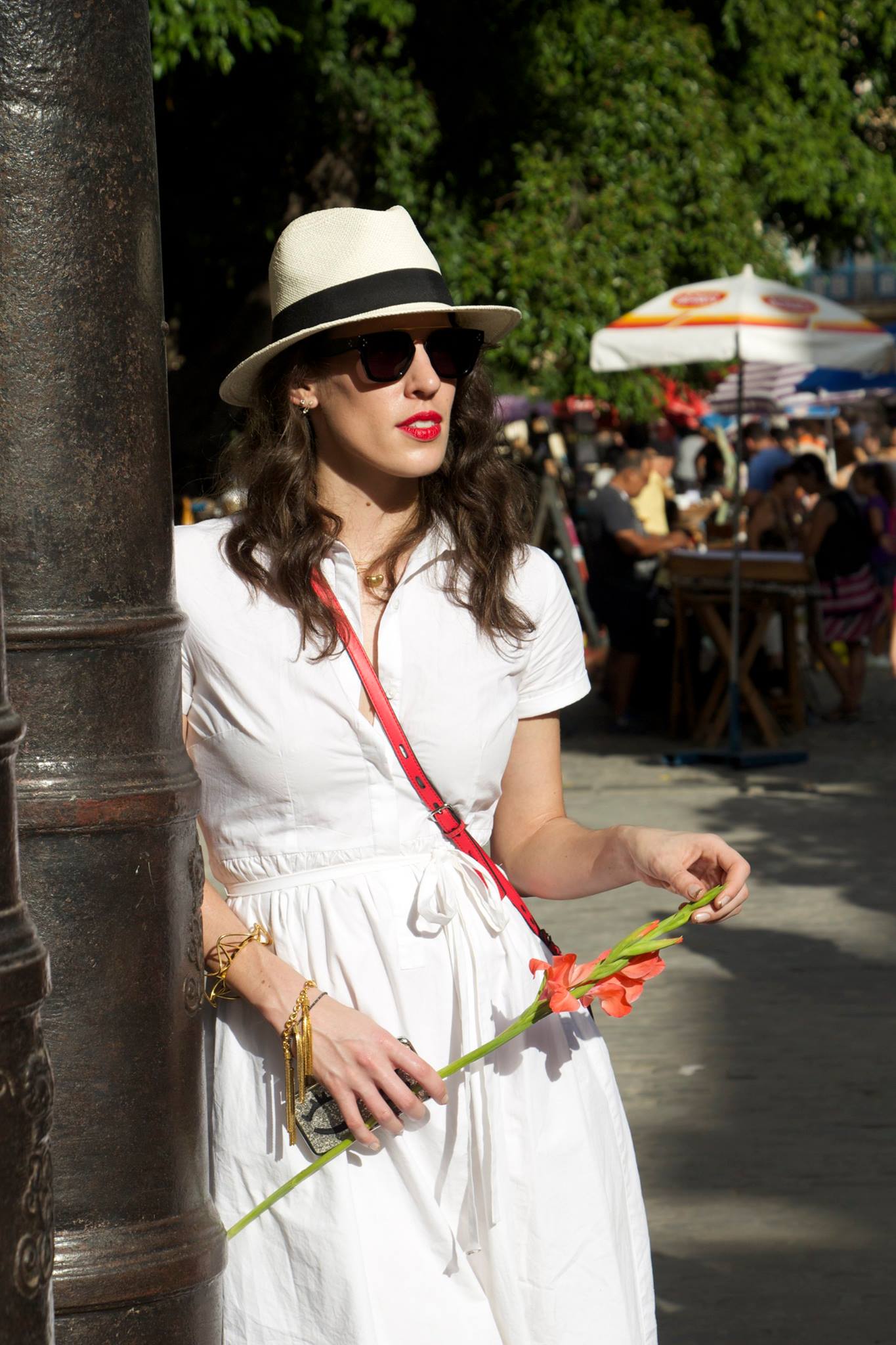   Emily just killed it with her Cuba styled outfits. Often wearing white with splashes of color was a great way to stand out and co-exist with Havana's bright pastels, and aged street corners.  &nbsp;  