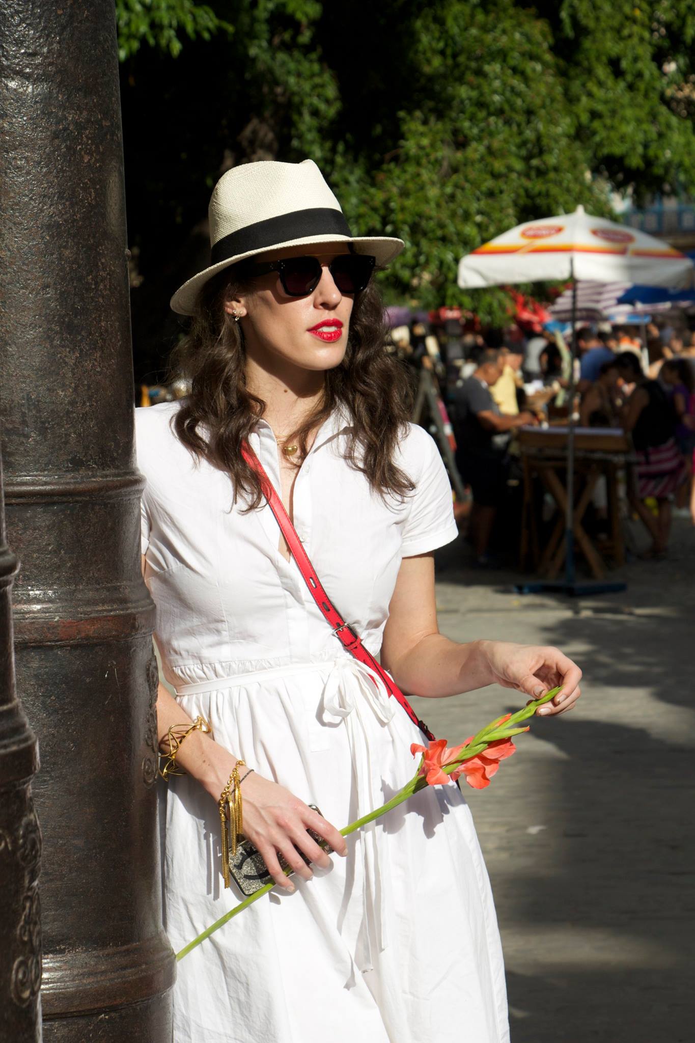 Emily just killed it with her Cuba styled outfits. Often wearing white with splashes of color was a great way to stand out and co-exist with Havana's bright pastels, and aged street corners. 