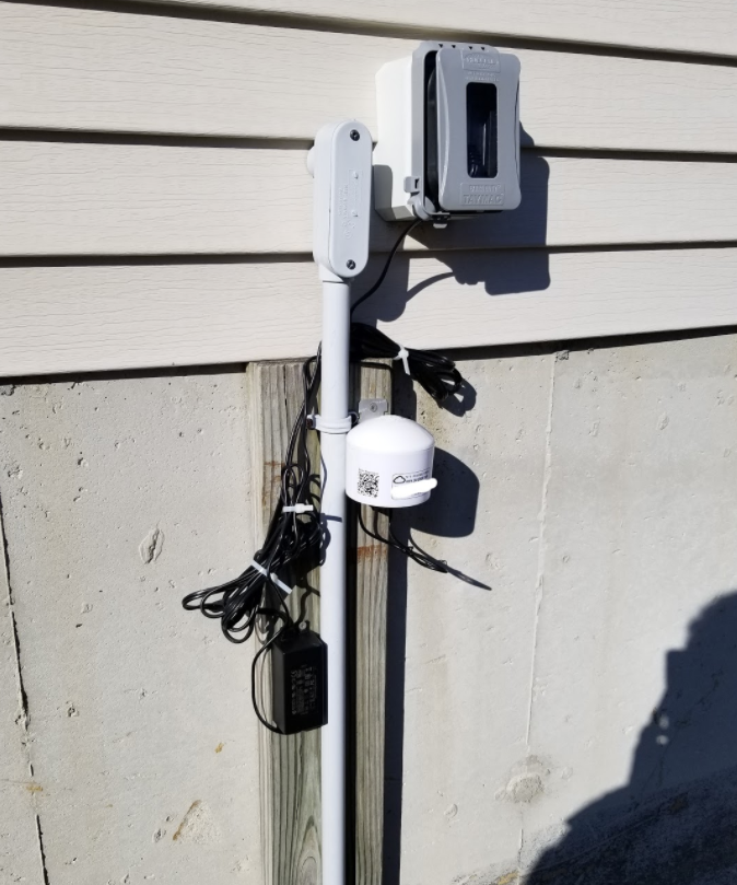 Photo of the purple air monitor in Quincy Point 