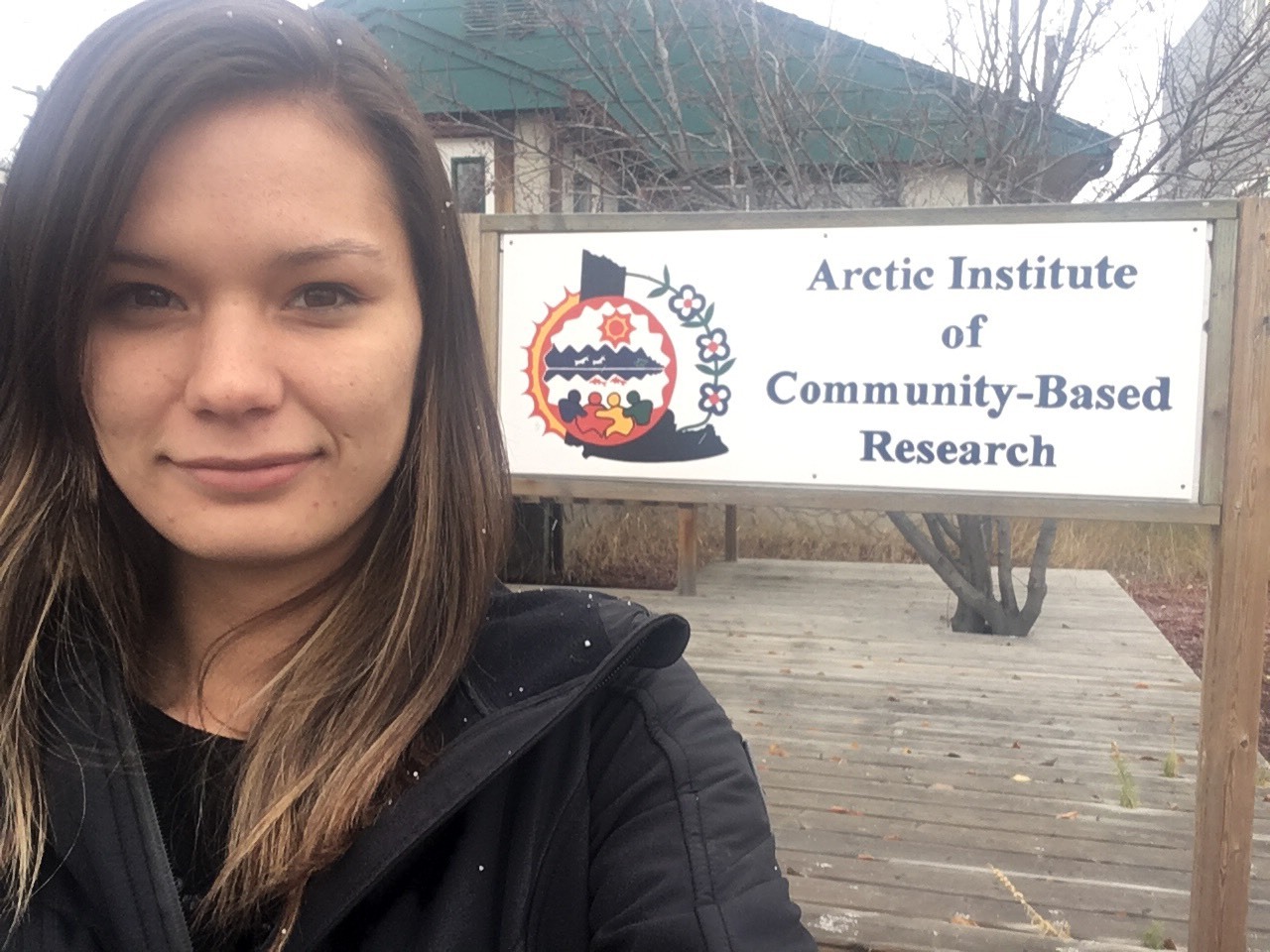 Pictured Above: Roberta Wally outside AICBR's office on Hanson Street. 
