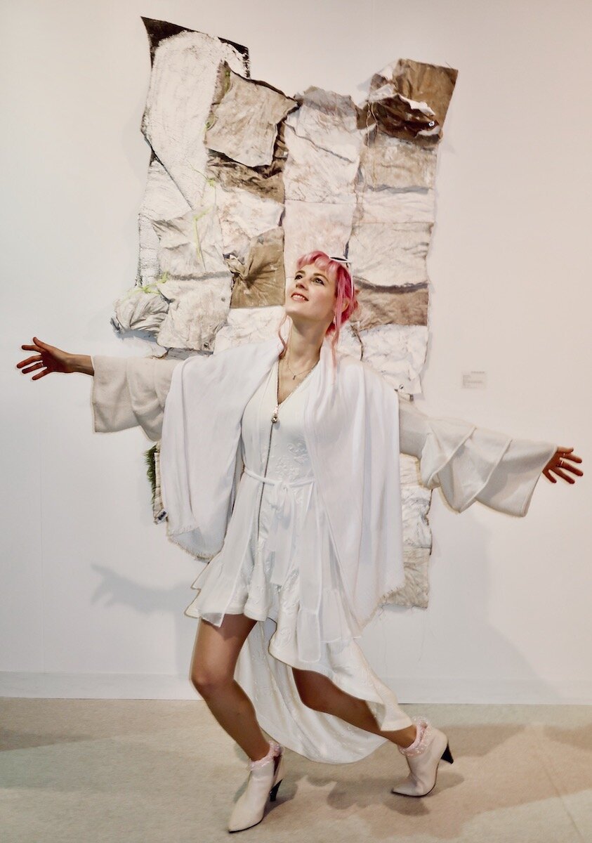 Spotted at Volta NY 2020 with Julia Sinelnikova (or_acle) in front of Marcia Kure wall hanging at Officine Dell Immagine