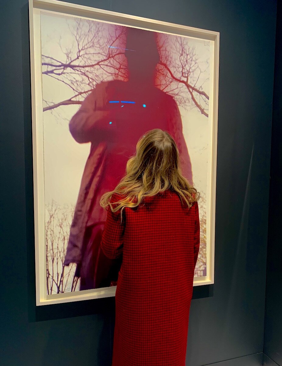 Spotted at The Armory Show 2020 with Eva Sinesio (eva_sinesio) standing before a silkscreen by Nona Faustine at Two Palms Gallery