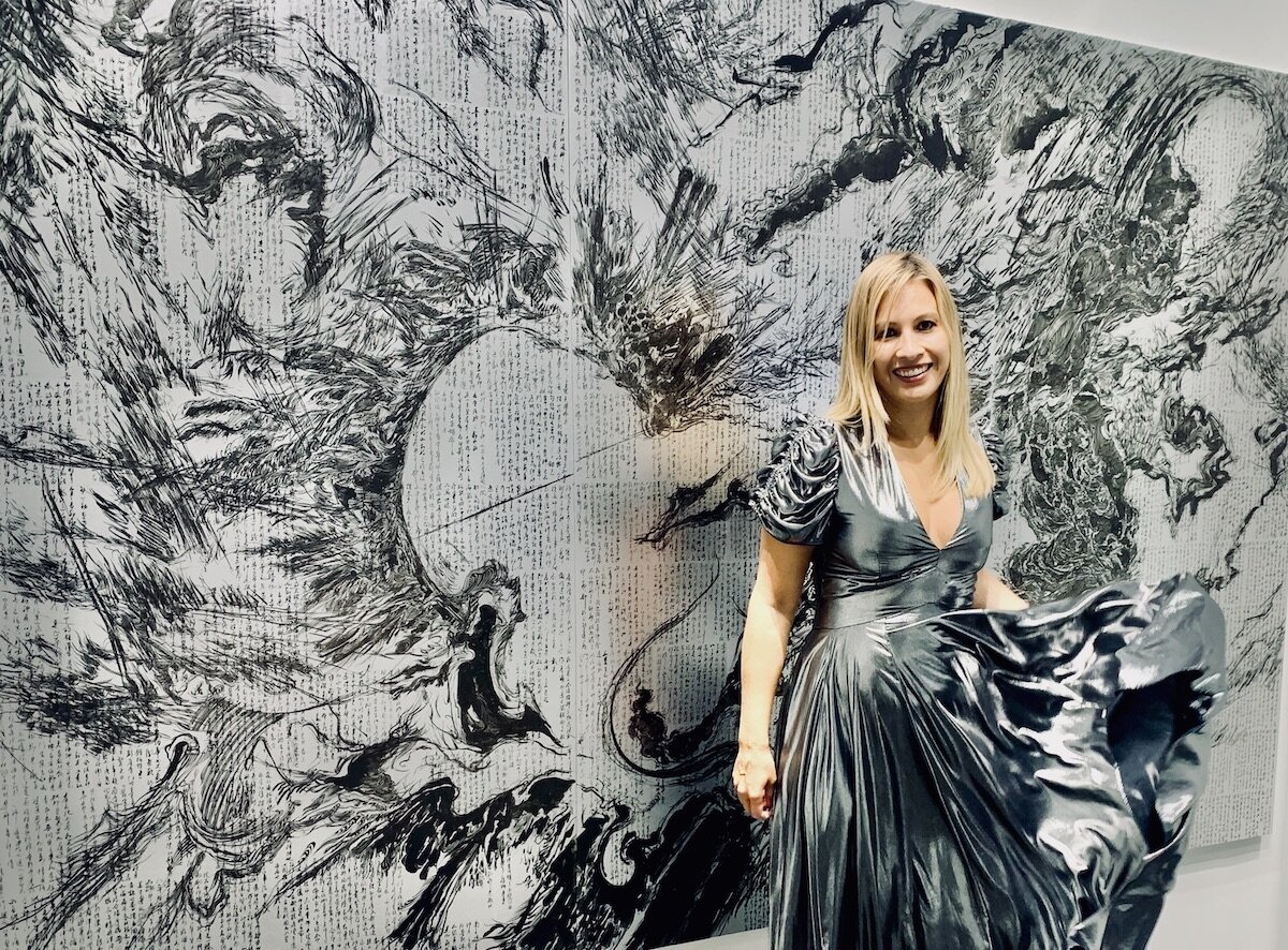 Spotted at the Armory Show with Elena Ash standing in front of Takafumi Asakura painting at A Lighthouse Called Kanata