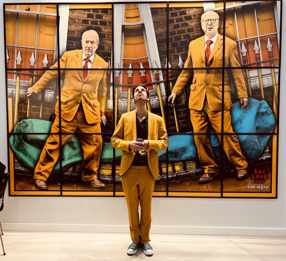 Spotted at Frieze LA with Alejandro in front of Gilbert & George mixed media prints at Lehmann Maupin
