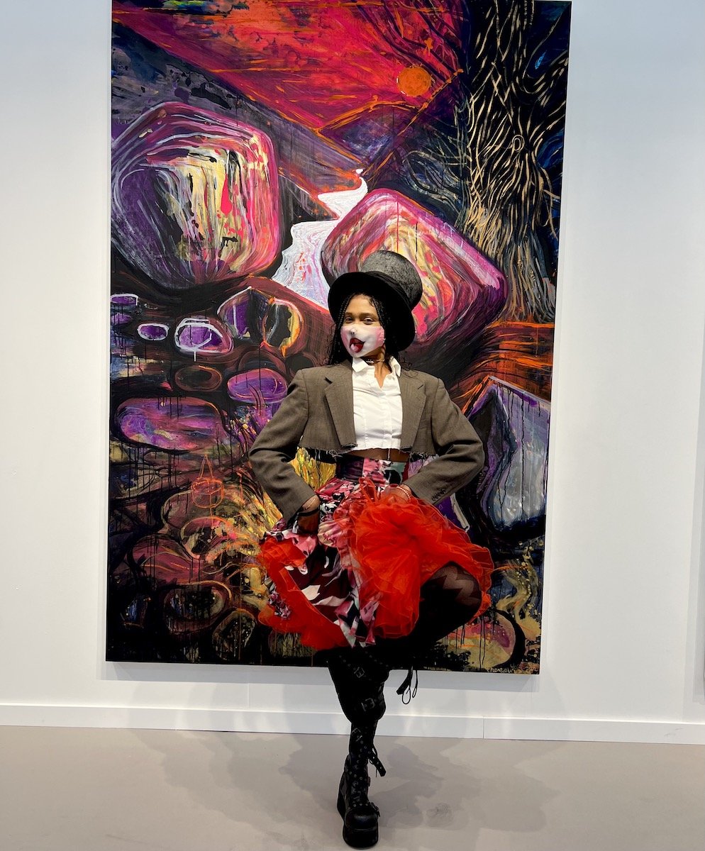 Spotted at Frieze with Ch4ndrika standing in front of Thomas Houseago painting at Xavier Hufkens Gallery