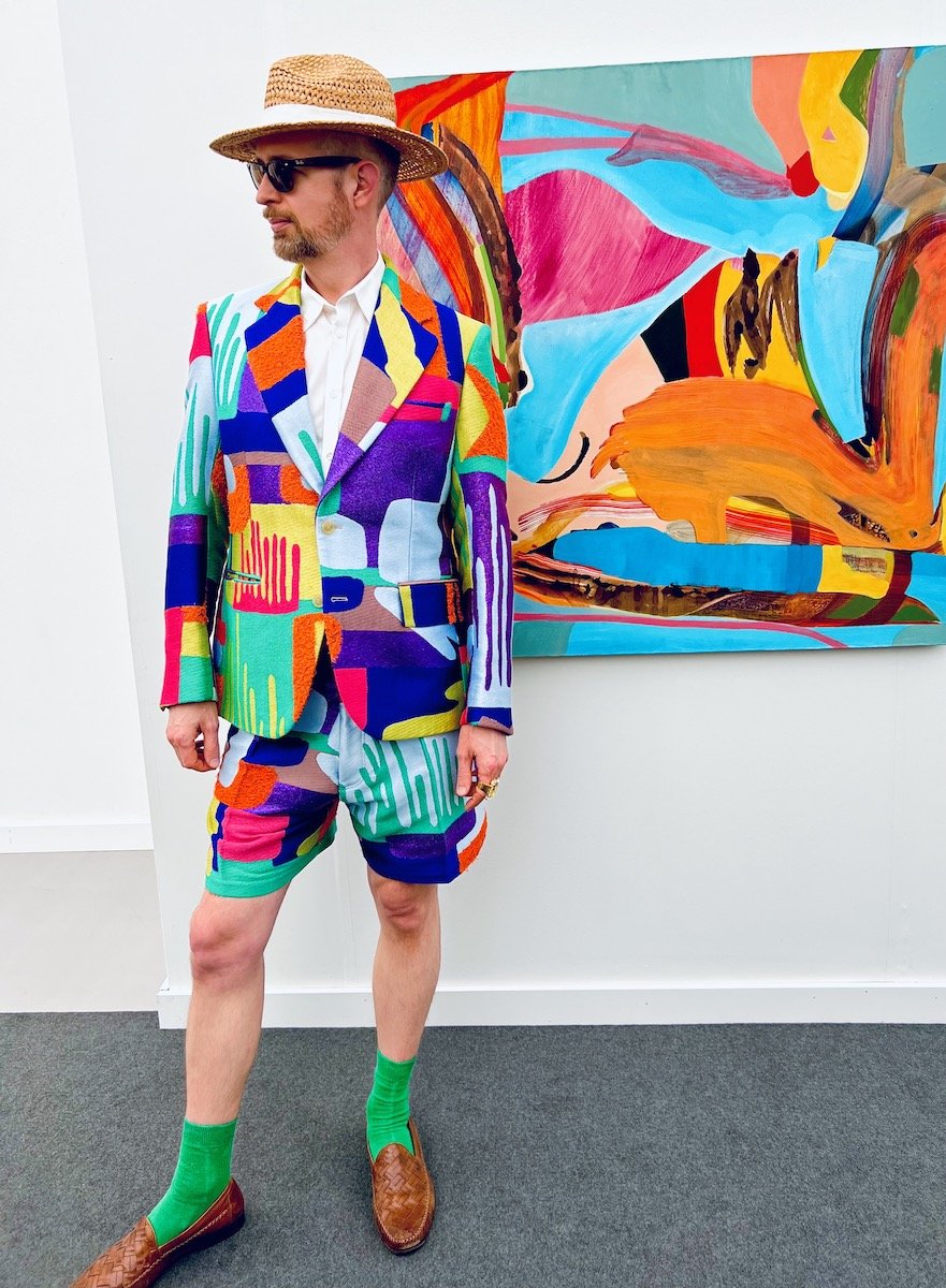 Spotted at Frieze LA with Justin standing in front of Marley Freeman painting at Karma Gallery