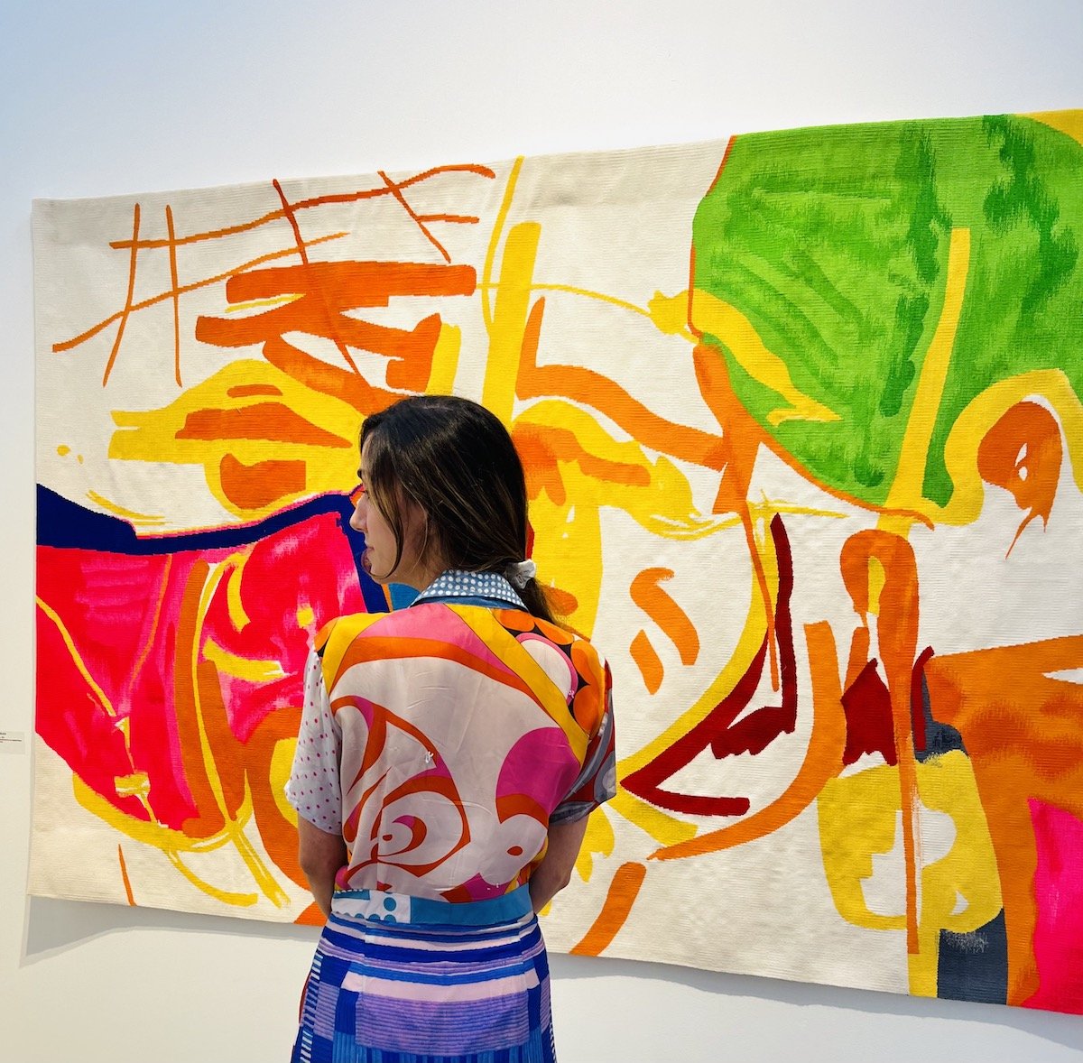 Spotted at Frieze NYC with Arin Madera looking at Etel Adnan’s tapestry at Galerie Lelong & Co