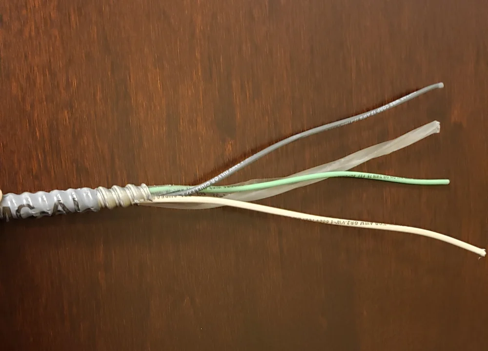 MC - with full size insulated equipment grounding conductor - photo courtesy of Paul Abernathy - https://www.masterthenec.com