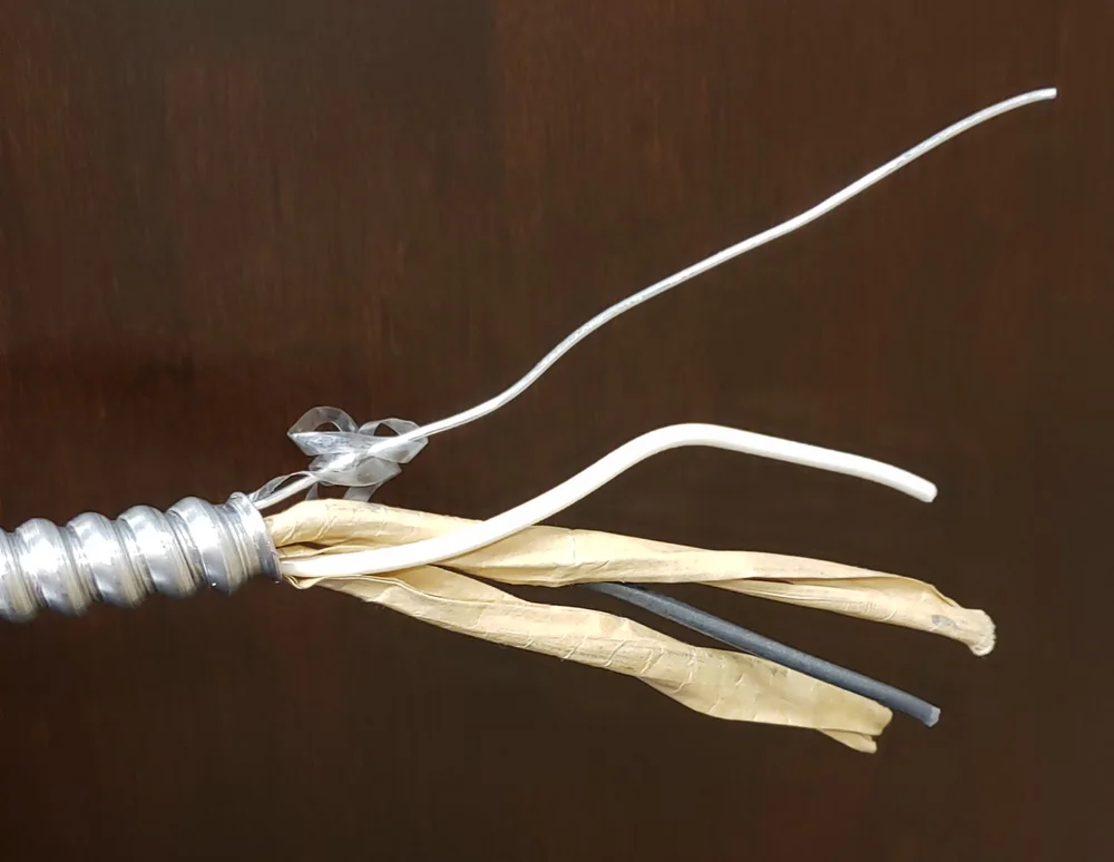 AC - with bare #16AWG equipment grounding conductor (bonding conductor) - photo courtesy of Paul Abernathy - https://www.masterthenec.com