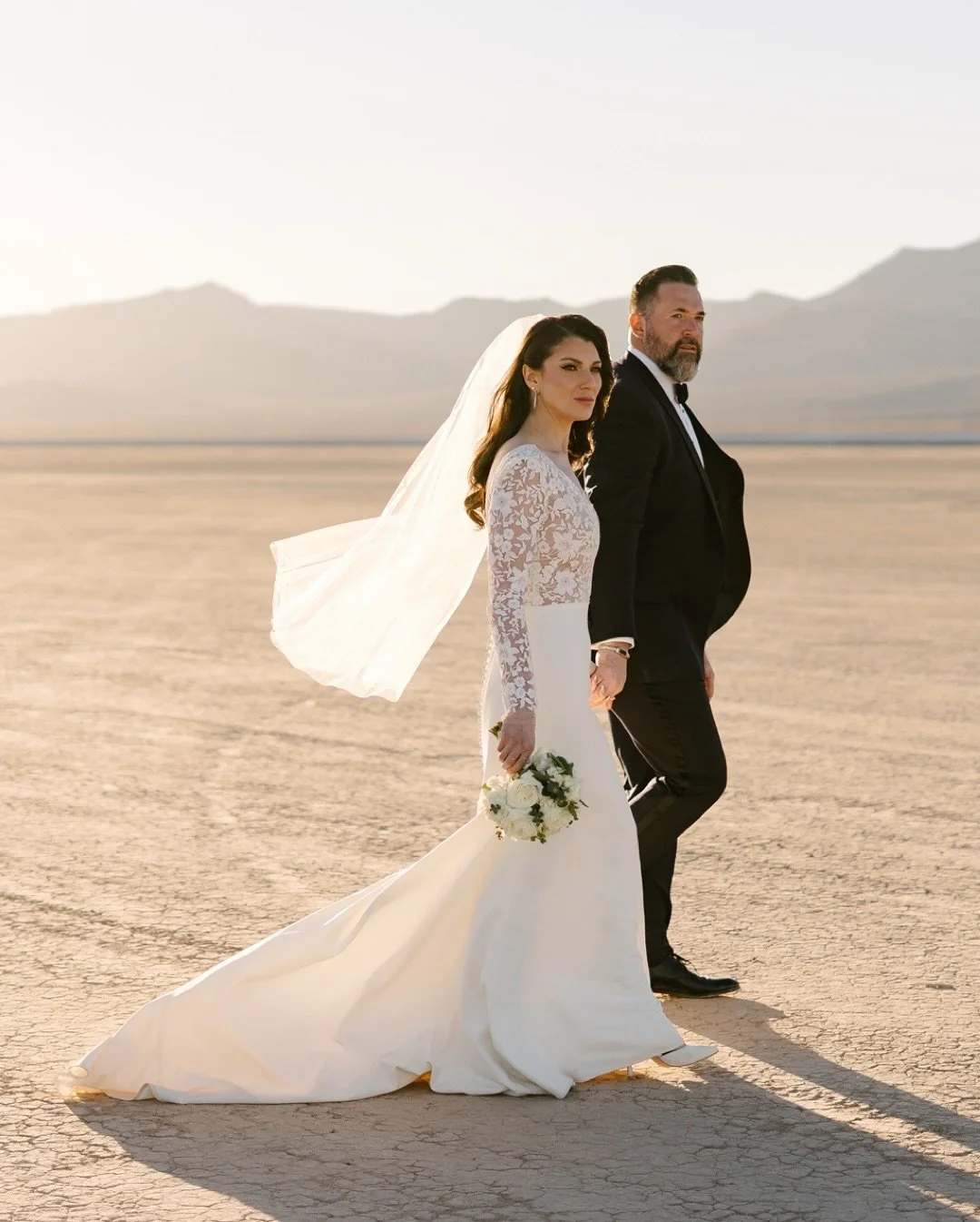 Earlier this year, I shot a gorgeous backyard wedding here in town, but my couple still wanted desert vibes, so we took them out to Nelson and the Dry Lake Bed before their ceremony. It was the best of both worlds - secluded, elopement-style photos w