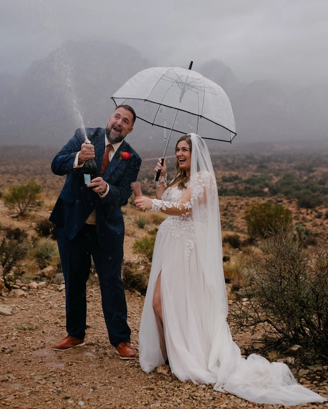 Anyone else feel like all this rain in the desert lately has been a nice change of pace? I know it&rsquo;s not what Danielle and Danny envisioned for their ceremony at Red Rock, especially because it&rsquo;s a place they hold near and dear to them, b