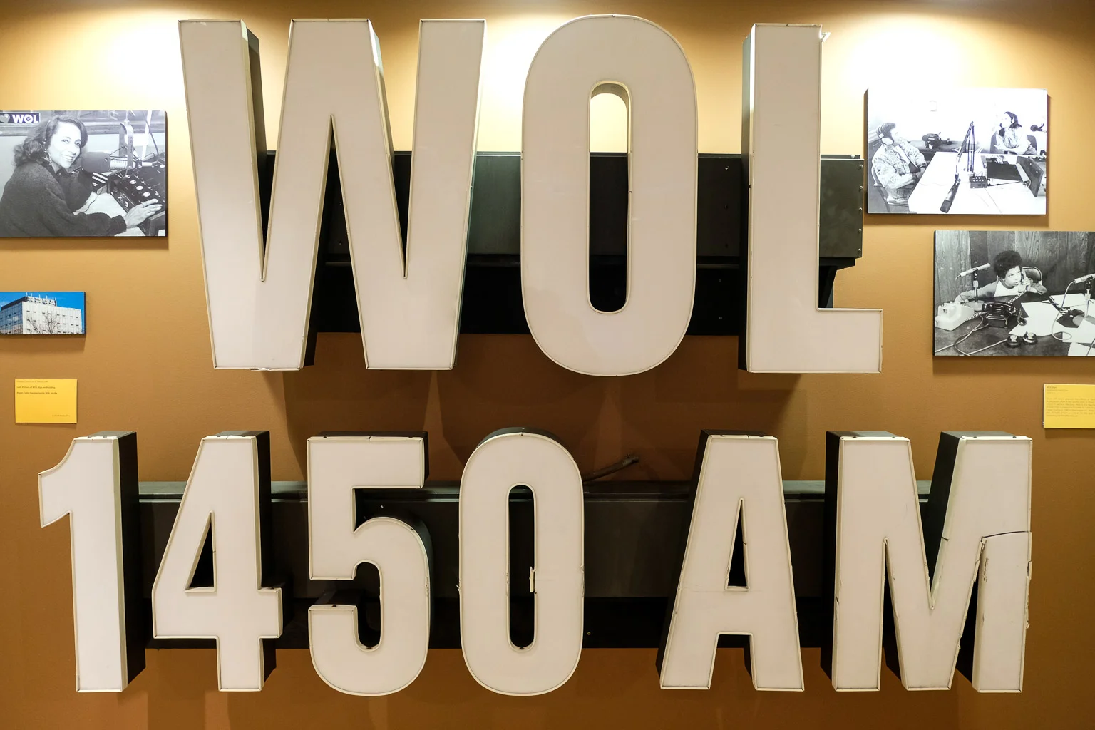 These call letters adorned the offices of Radio One's headquarters when it was located in Prince George's County in Lanham, Maryland. WOL is the flagship station of Radio One, a corporation founded by Cathy Hughes and Dewey Hughes in 1980 in Washington, DC. They currently own several dozen radio stations as well as TV One and the social networking site BlackPlanet.com.