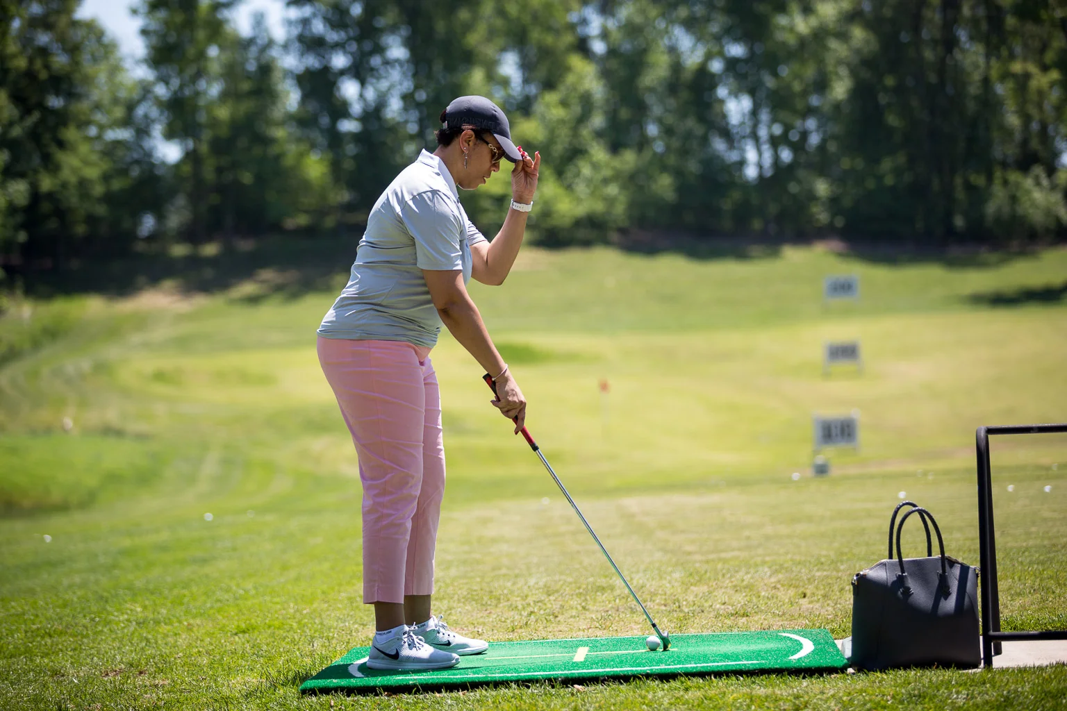 "I'm 'bout to smack the cover off this ball...OR I'm gonna take a divot out of this mat. But whichever one happens, I meant to do it!"