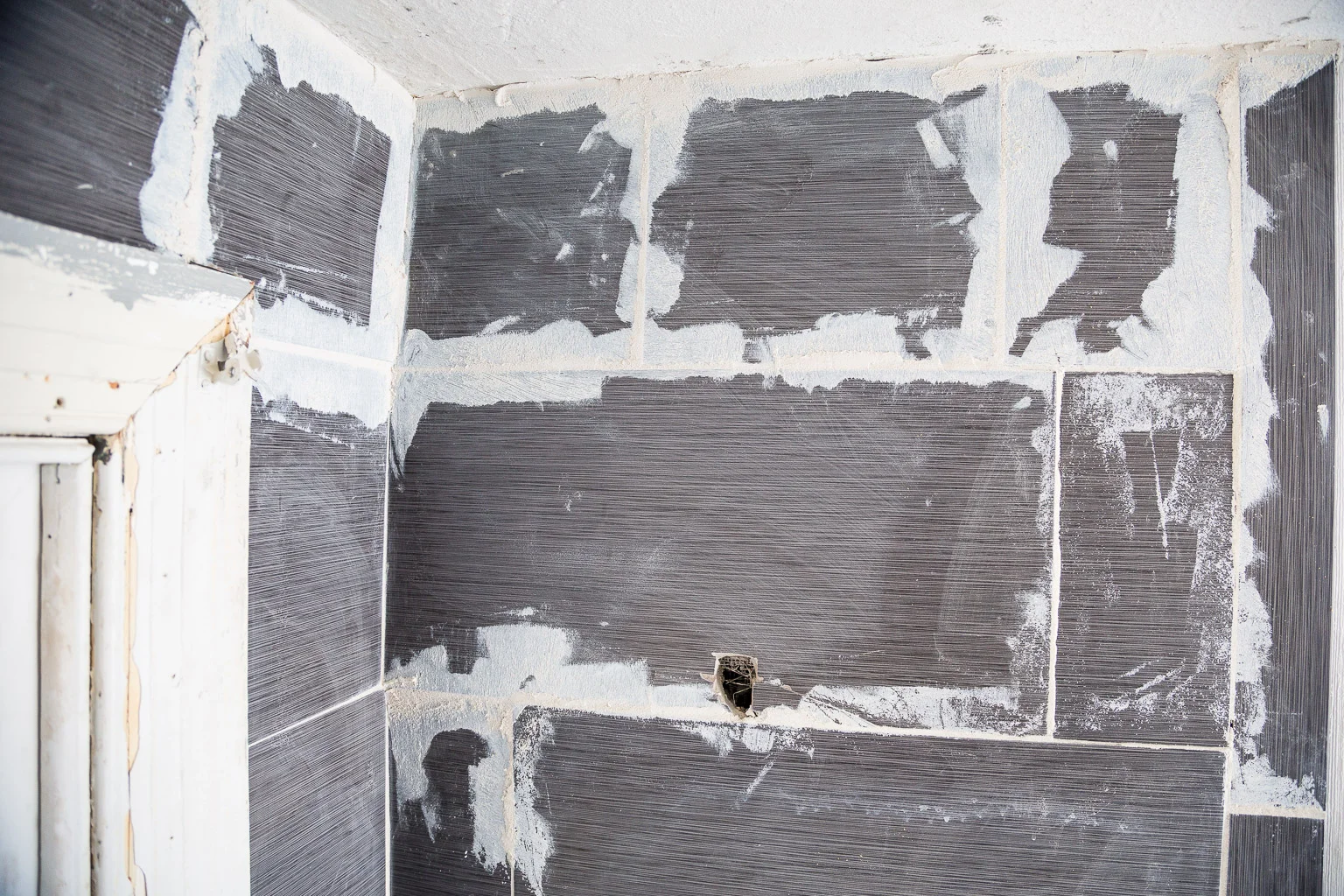 The tile job was so poor, I had my new contractor remove it all.